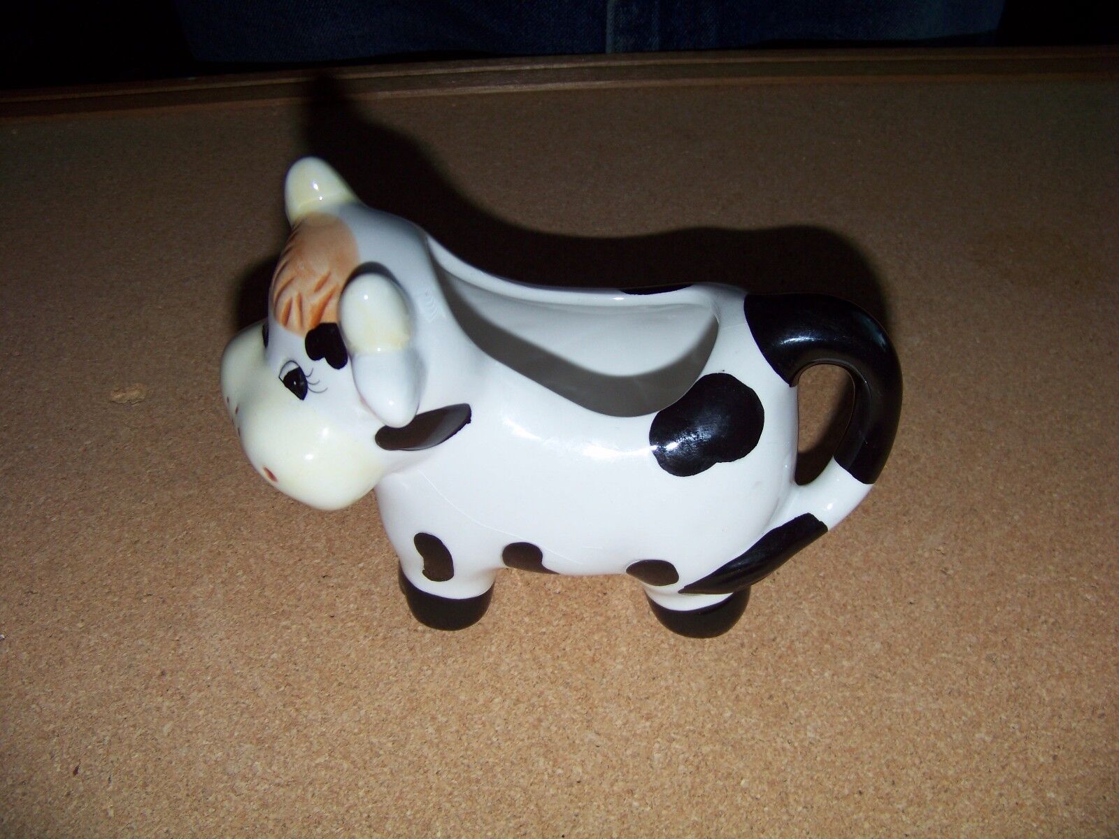 spotted cow porcelain pitcher about 4.5\