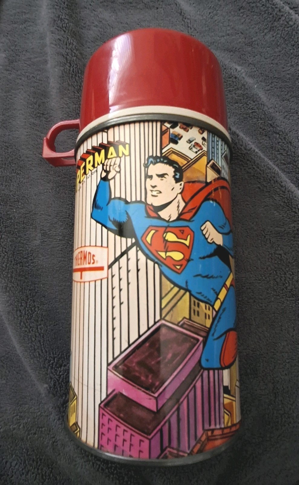 VINTAGE 1967 SUPERMAN METAL THERMOS W/ Red cap & stopper. NM shape C-9 plus VINTAGE 1967 SUPERMAN METAL THERMOS W/ Red cap & stopper. NM shape C-9 plus