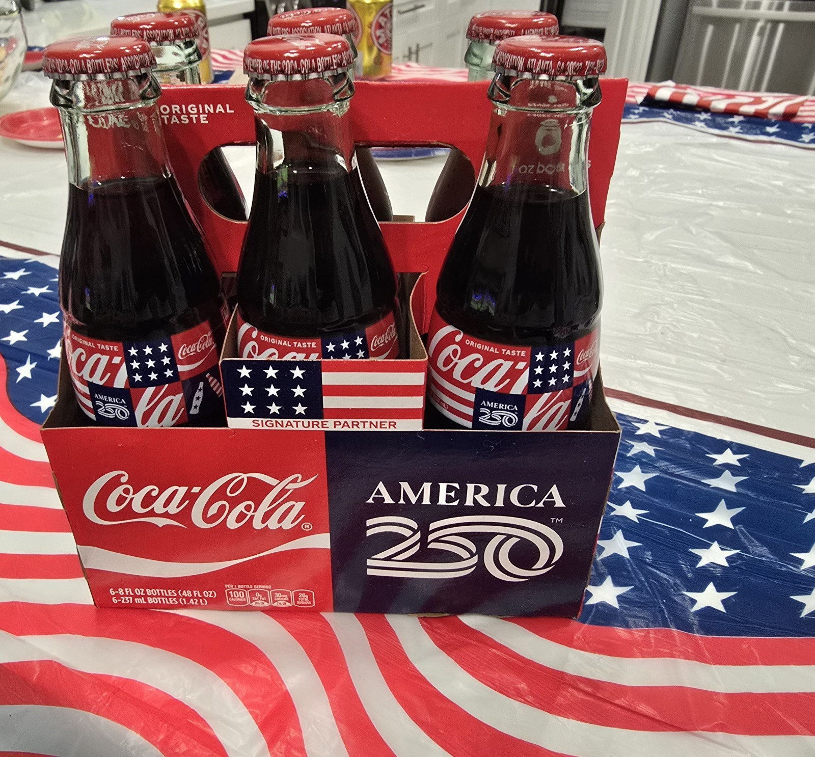 Coca Cola AMERICA 250 CELEBRATING 250th ANNIVERSARY 1 GLASS BOTTLE 8 OZ Coca Cola AMERICA 250 CELEBRATING 250th ANNIVERSARY 1 GLASS BOTTLE 8 OZ