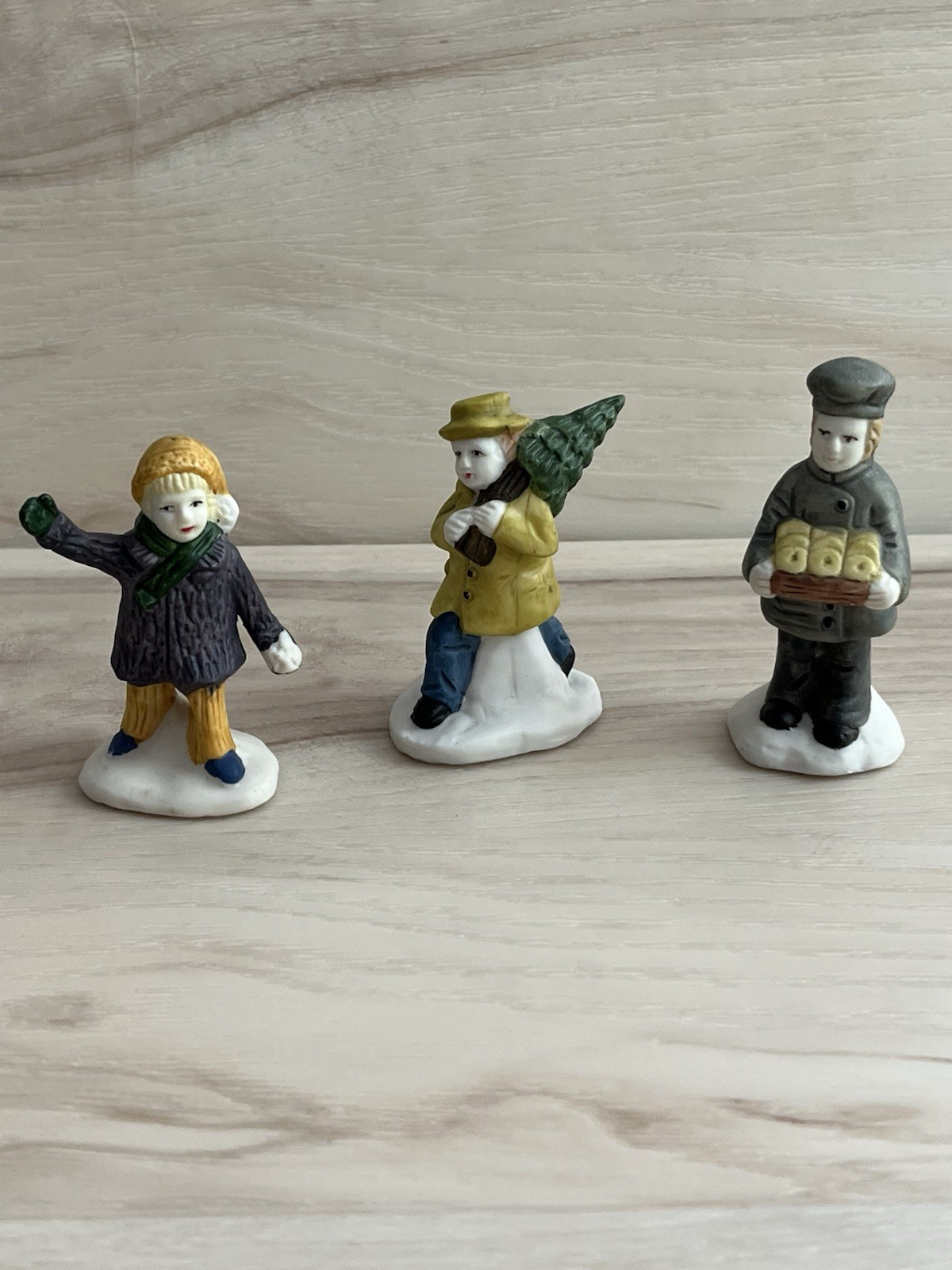 3 VTG Christmas Village Figurines: Waving Girl Man / Tree & Baker 3 VTG Christmas Village Figurines: Waving Girl Man / Tree & Baker