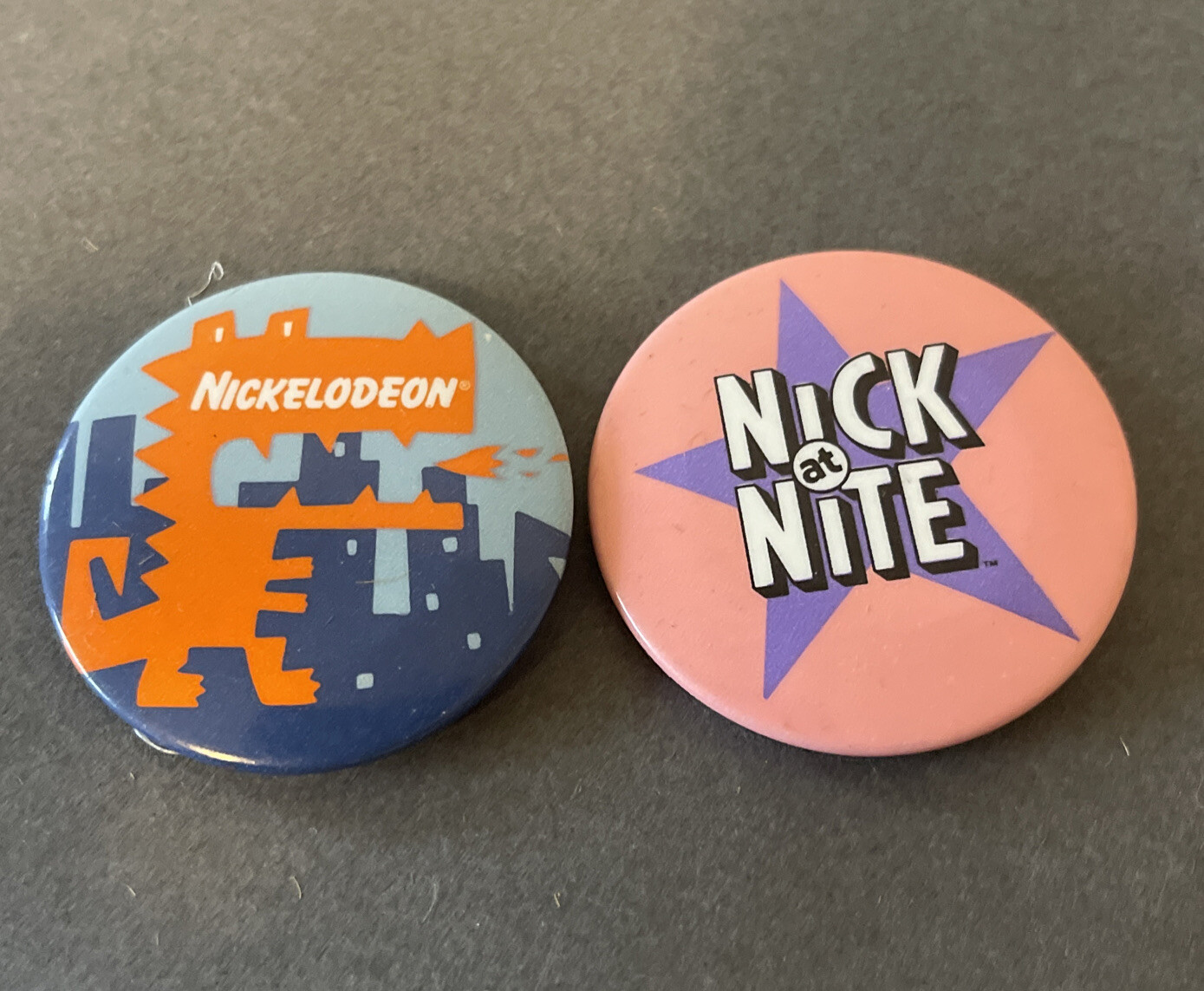 2 Vintage Nick at Nite Rare Star Metal Nickelodeon Pinback Button Bundle Reptar 2 Vintage Nick at Nite Rare Star Metal Nickelodeon Pinback Button Bundle Reptar