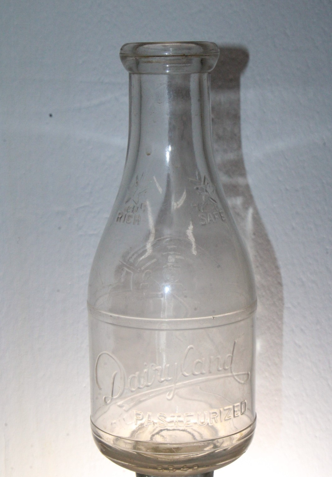 MACON GA SUNSHINE DAIRIES MILK BOTTLE QUART EMBOSSED MACON GA SUNSHINE DAIRIES MILK BOTTLE QUART EMBOSSED
