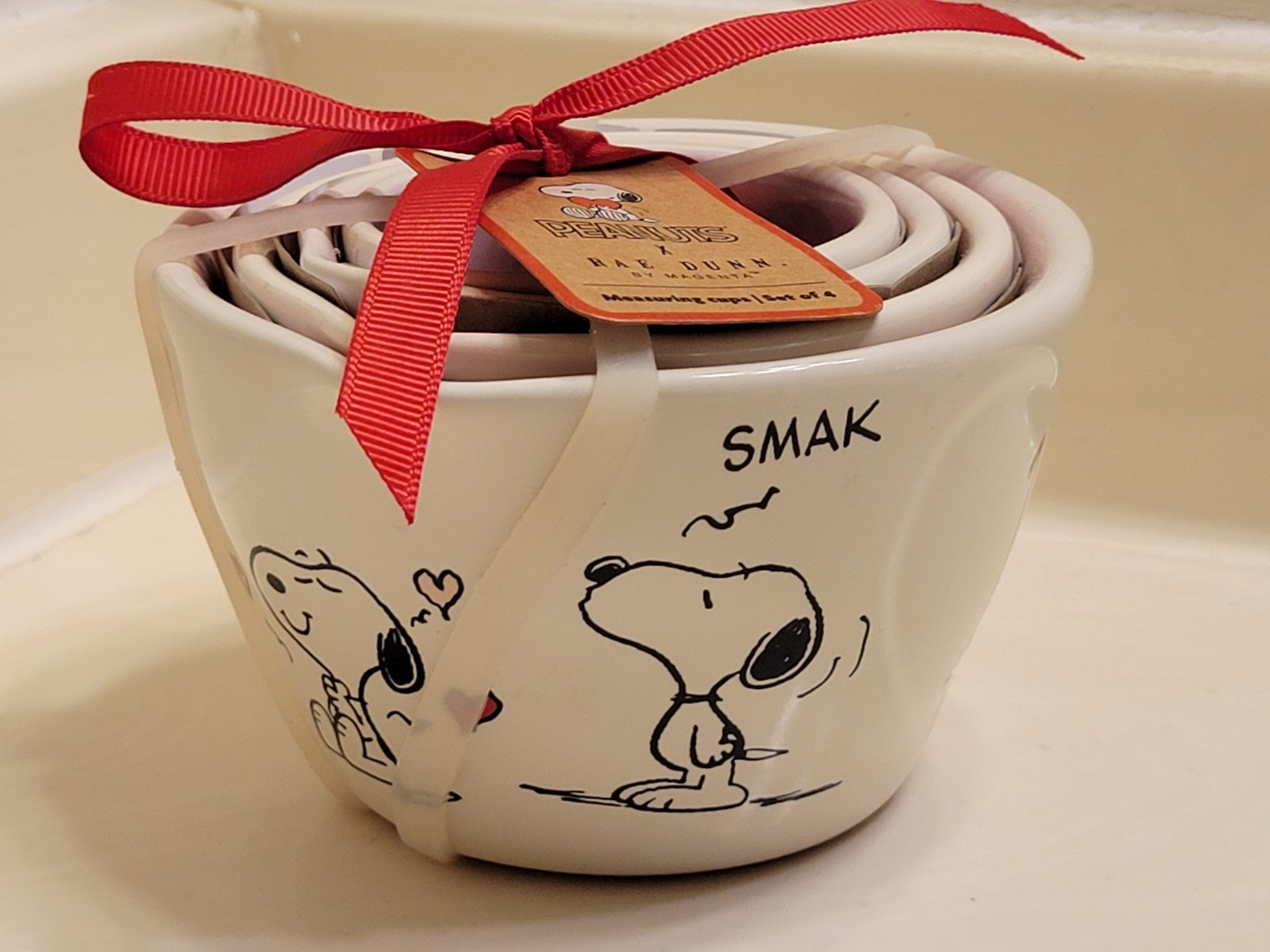 PEANUTS CERAMIC MEASURING CUPS by RAE DUNN / SET OF FOUR / BRAND NEW
