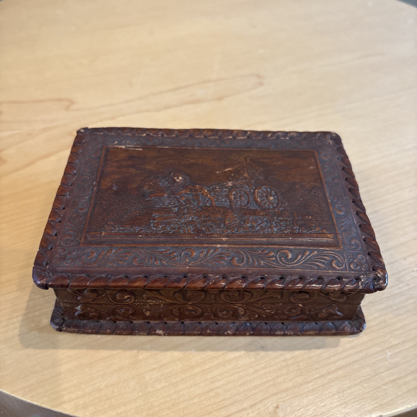 vintage Italian hand tooled embossed leather covered wooden cigarette box. vintage Italian hand tooled embossed leather covered wooden cigarette box.