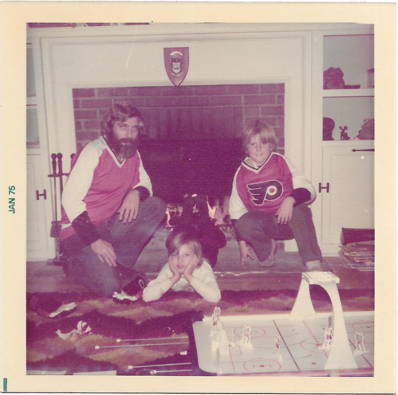 vintage color photo man boys Philadelphia Flyers shirt tabletop hockey game 1975