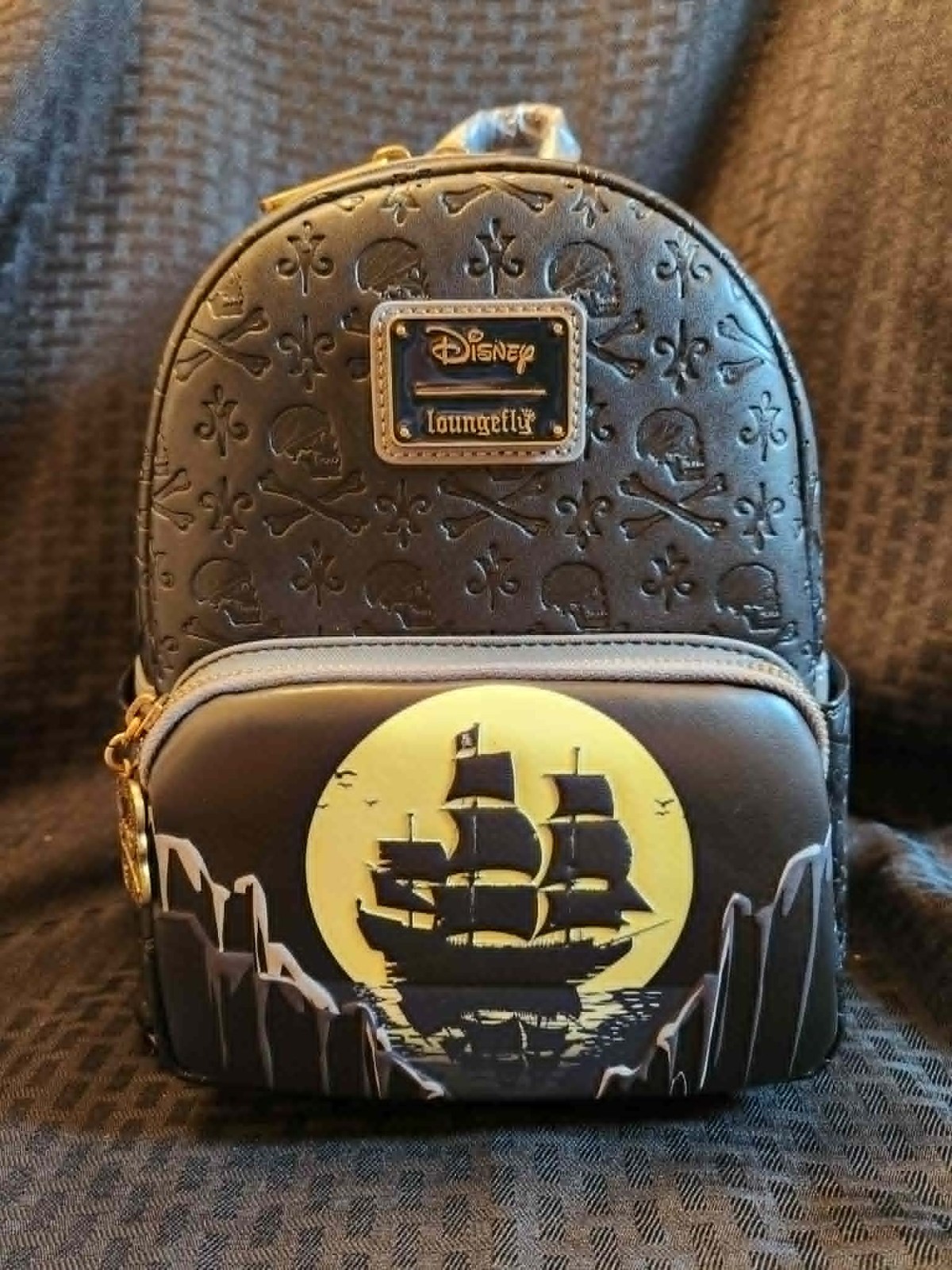 Loungefly Disney Pirates of the Caribbean Black Pearl Glow in Dark Backpack Loungefly Disney Pirates of the Caribbean Black Pearl Glow in Dark Backpack