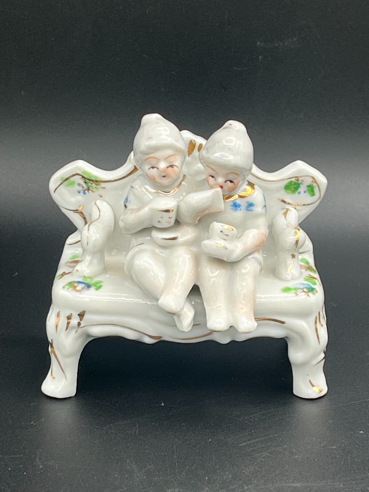 Vintage porcelain figurine made in Occupied Japan 1945-1952, 2 women sitting on