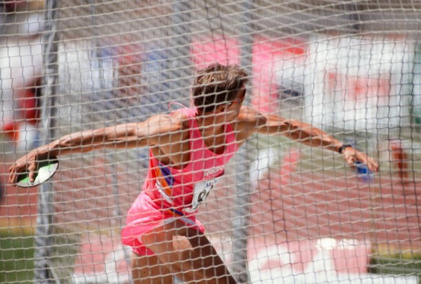 Dave Johnson USA competes in the Discus event Decathlon 1991 TAC C- Old Photo