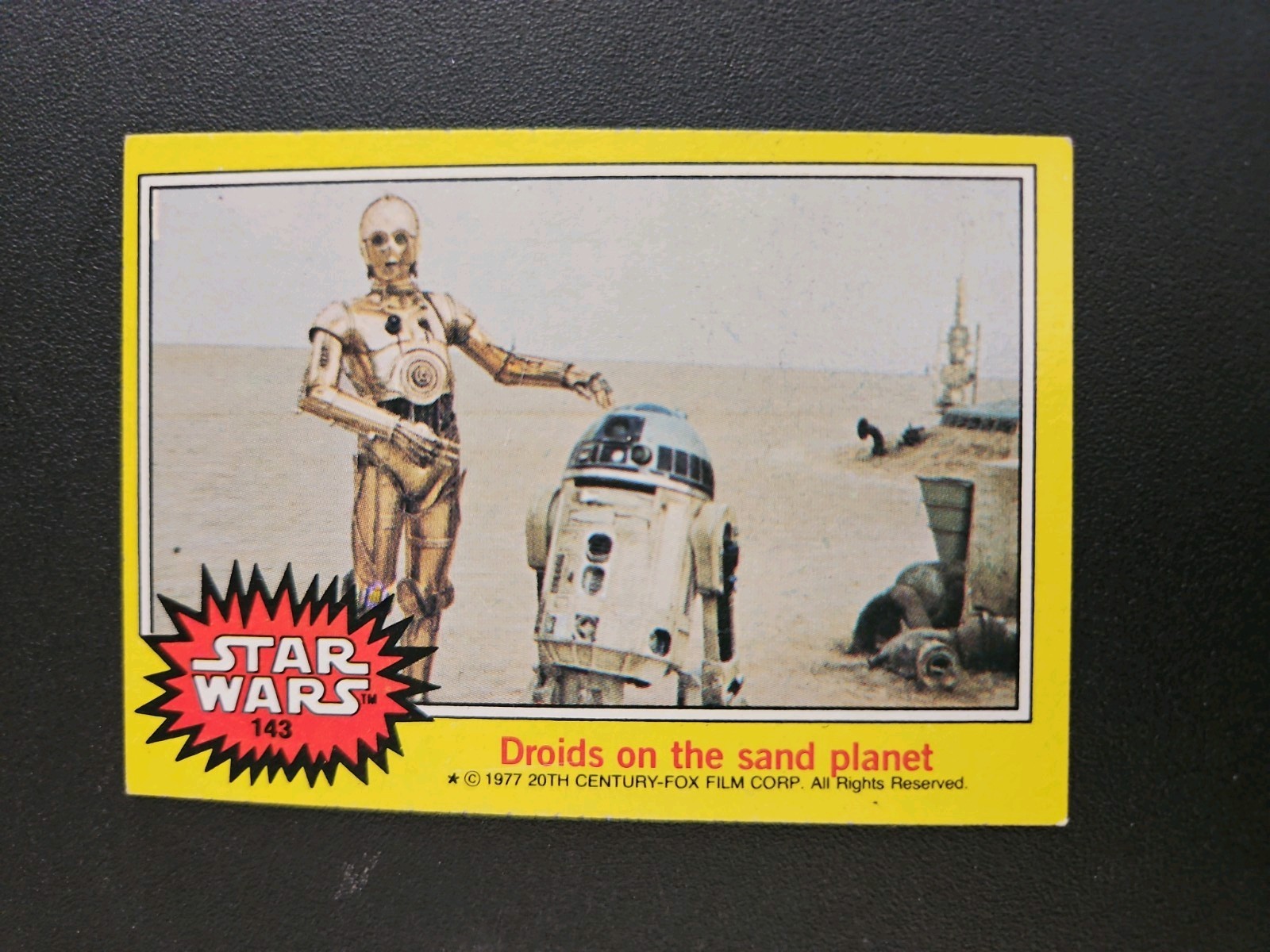 Topps 1977 Star Wars Series 3 Yellow #143 Droids On the Sand Planet Topps 1977 Star Wars Series 3 Yellow #143 Droids On the Sand Planet
