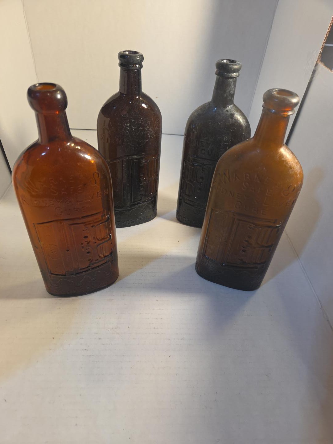 4 Antique Warner’s Safe Kidney Liver Cure Bottles Rochester New York Blob Top. 4 Antique Warner’s Safe Kidney Liver Cure Bottles Rochester New York Blob Top.