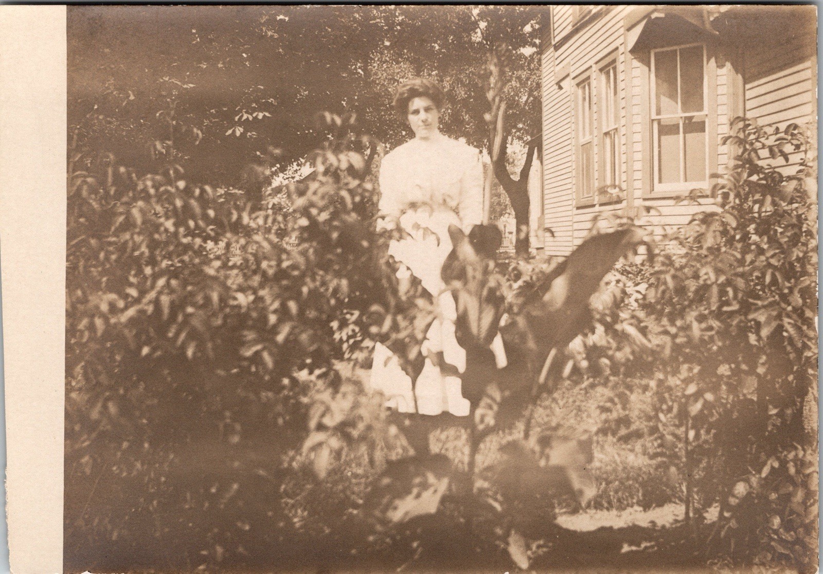 Postcard Real Photo RPPC Woman Standing Next to House Unposted