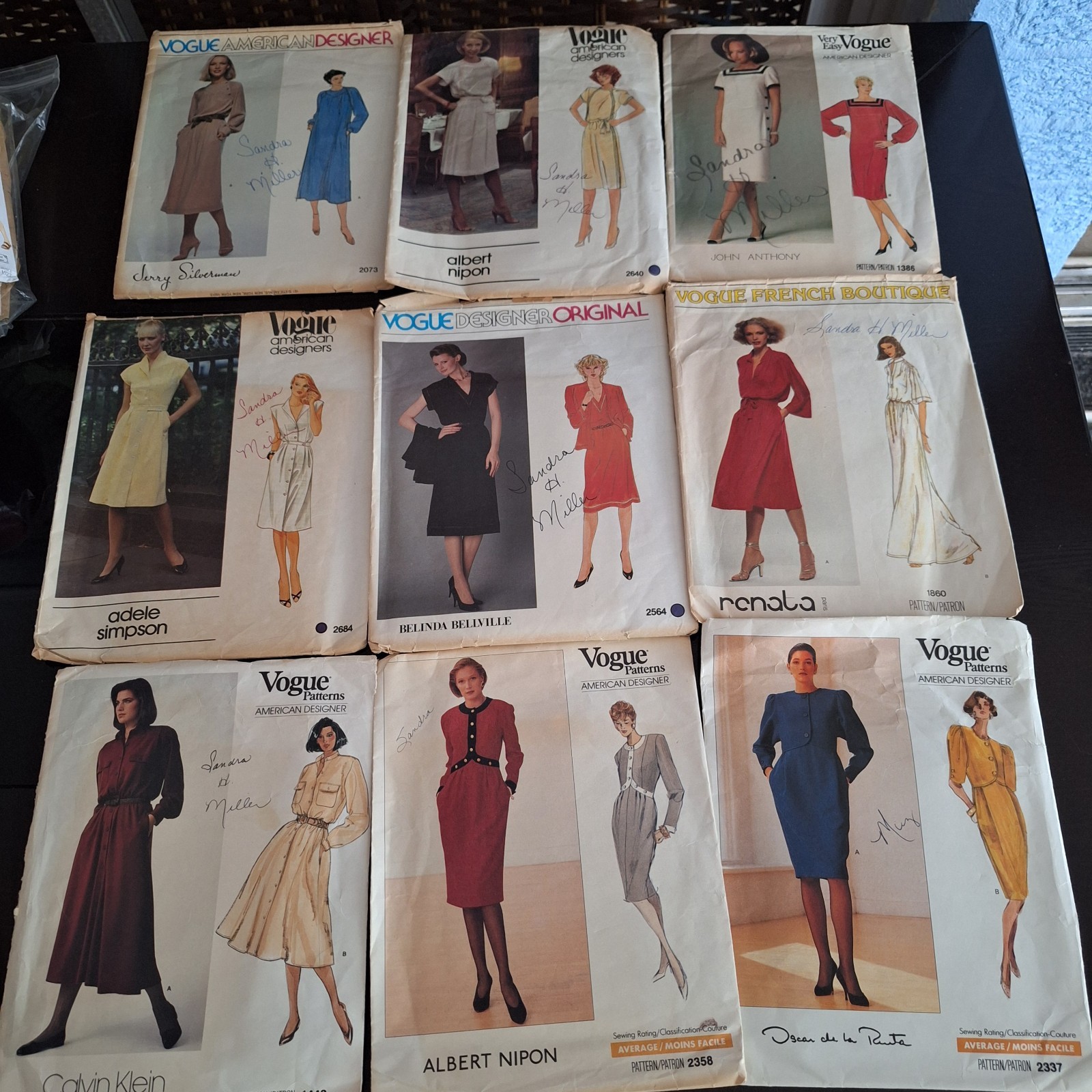 Lot 9-Vintage 1980's Vogue Designer Sewing Patterns Oscar De La Renta + Etc. Cut Lot 9-Vintage 1980's Vogue Designer Sewing Patterns Oscar De La Renta + Etc. Cut