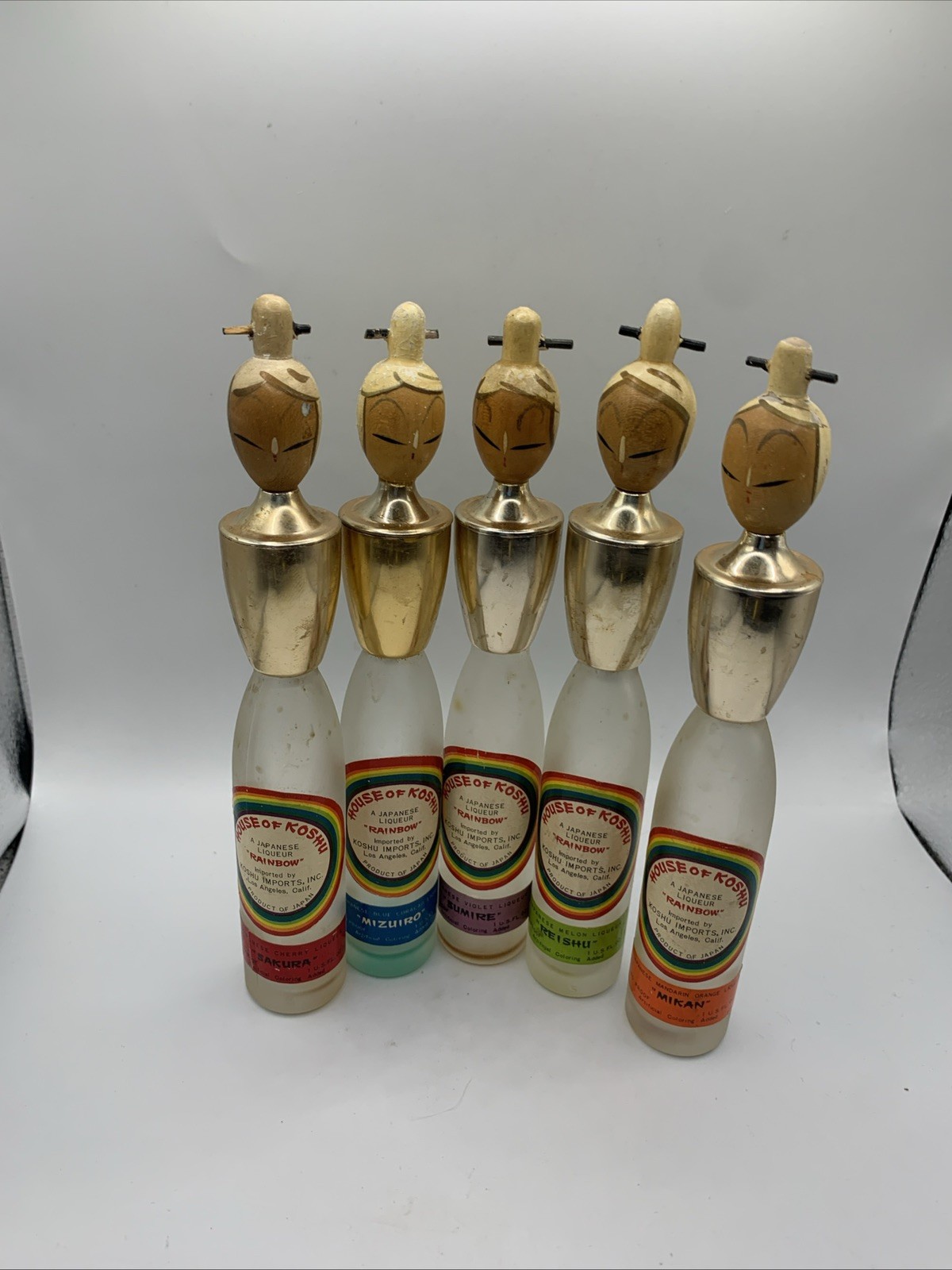 HOUSE of KOSHU - 5 Wooden Head Geisha Japanese Rainbow Sake Bottles Empty VTG HOUSE of KOSHU - 5 Wooden Head Geisha Japanese Rainbow Sake Bottles Empty VTG