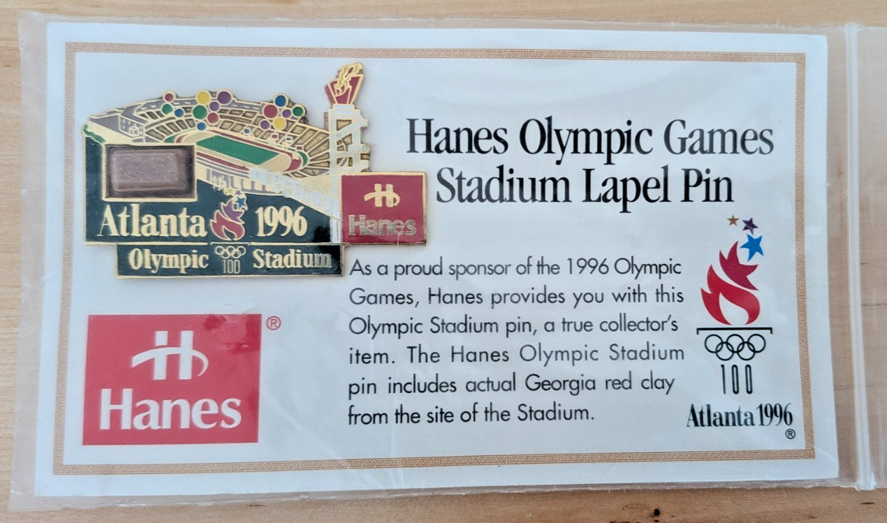 1996 Atlanta Summer Olympics Hanes Sponsor Stadium Lapel Pin w/ Georgia Red Clay 1996 Atlanta Summer Olympics Hanes Sponsor Stadium Lapel Pin w/ Georgia Red Clay