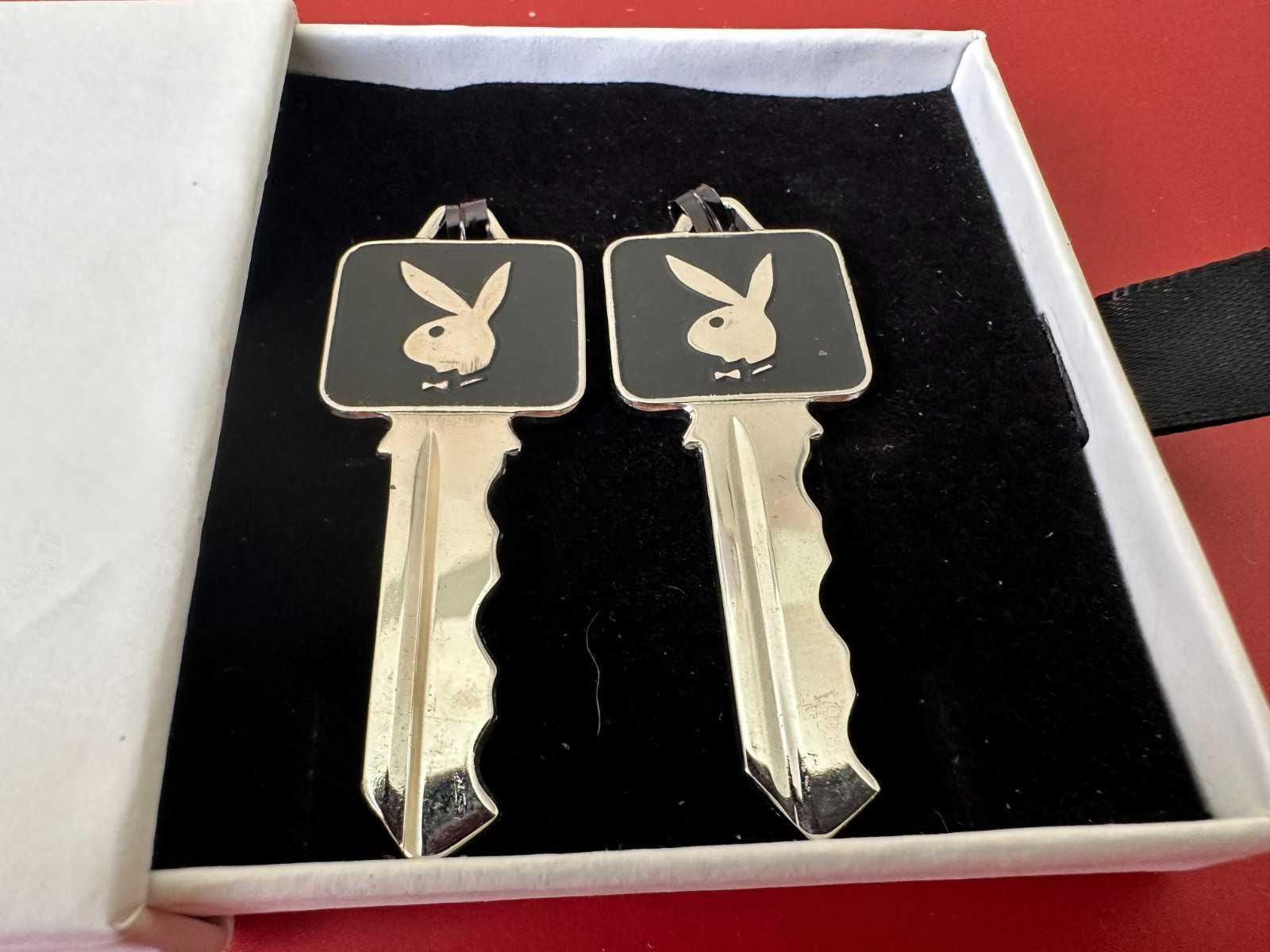 TWO VINTAGE 60S MINTY CONSECUTIVE NUMBERED PLAYBOY DETROIT MEMBERSHIP KEYS RARE