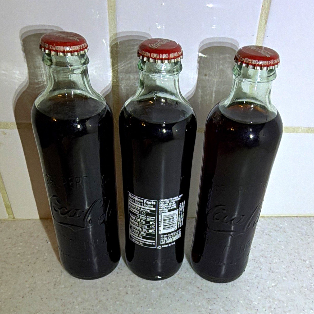 Coca-Cola Classic Clear Glass Soda Advertising Bottles w/ Red Caps Lot of 3
