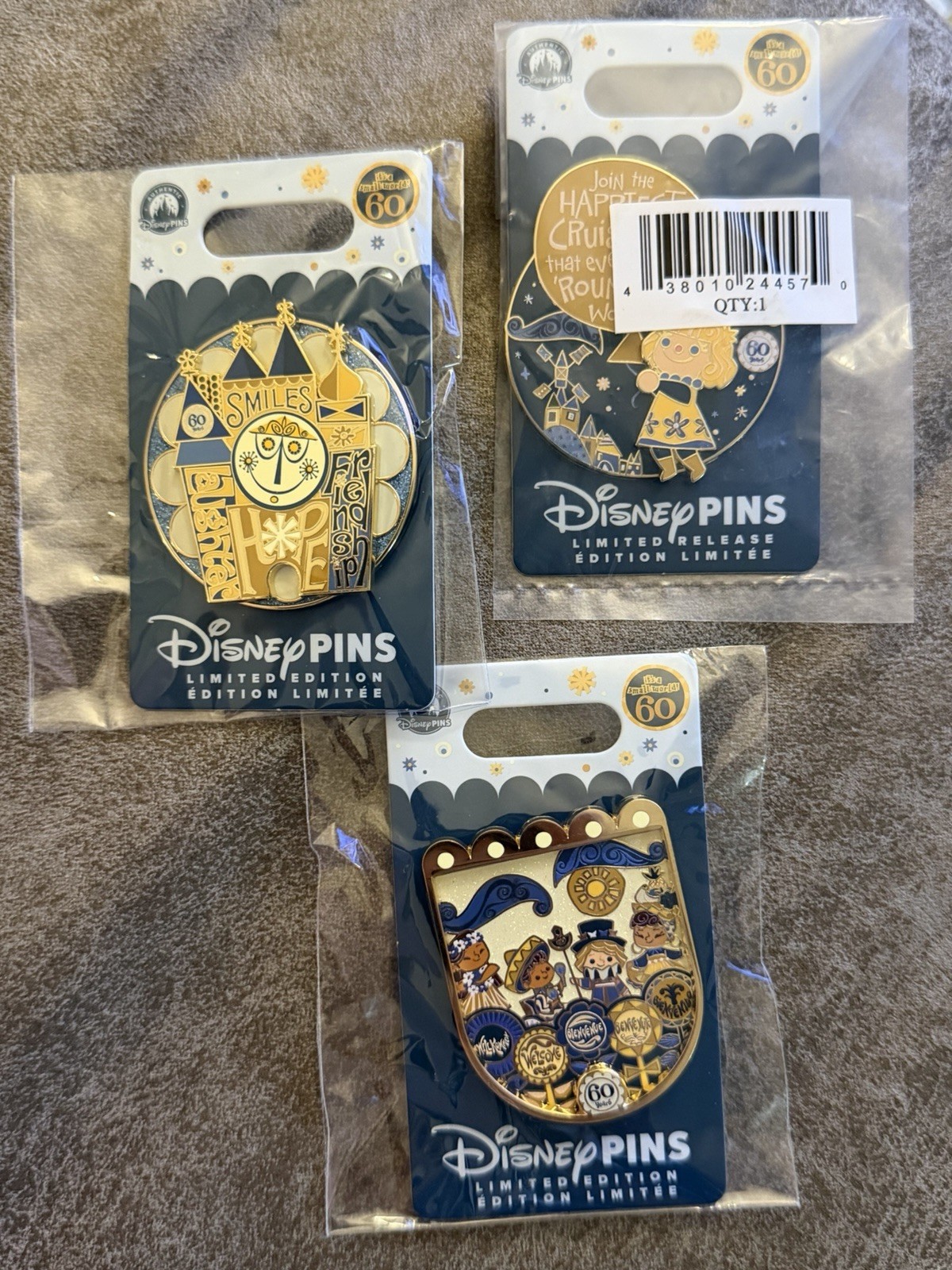 Disneyland It's a Small World 60th Anniversary LE 3000 pins Disneyland It's a Small World 60th Anniversary LE 3000 pins