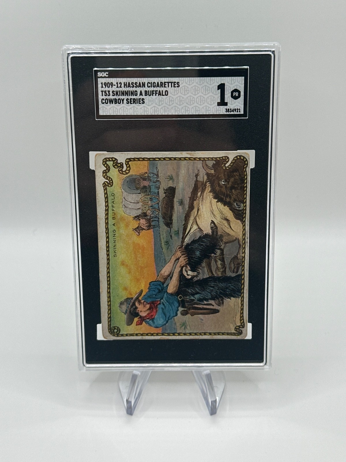 1909-12 Hassan Cigarettes Cowboy Series - Skinning A Buffalo SGC Authentic 1909-12 Hassan Cigarettes Cowboy Series - Skinning A Buffalo SGC Authentic