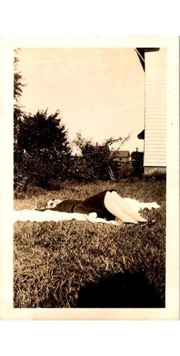 1950s Woman Relaxing Outdoors Photograph Sepia Print Backyard Leisure Aesthetic