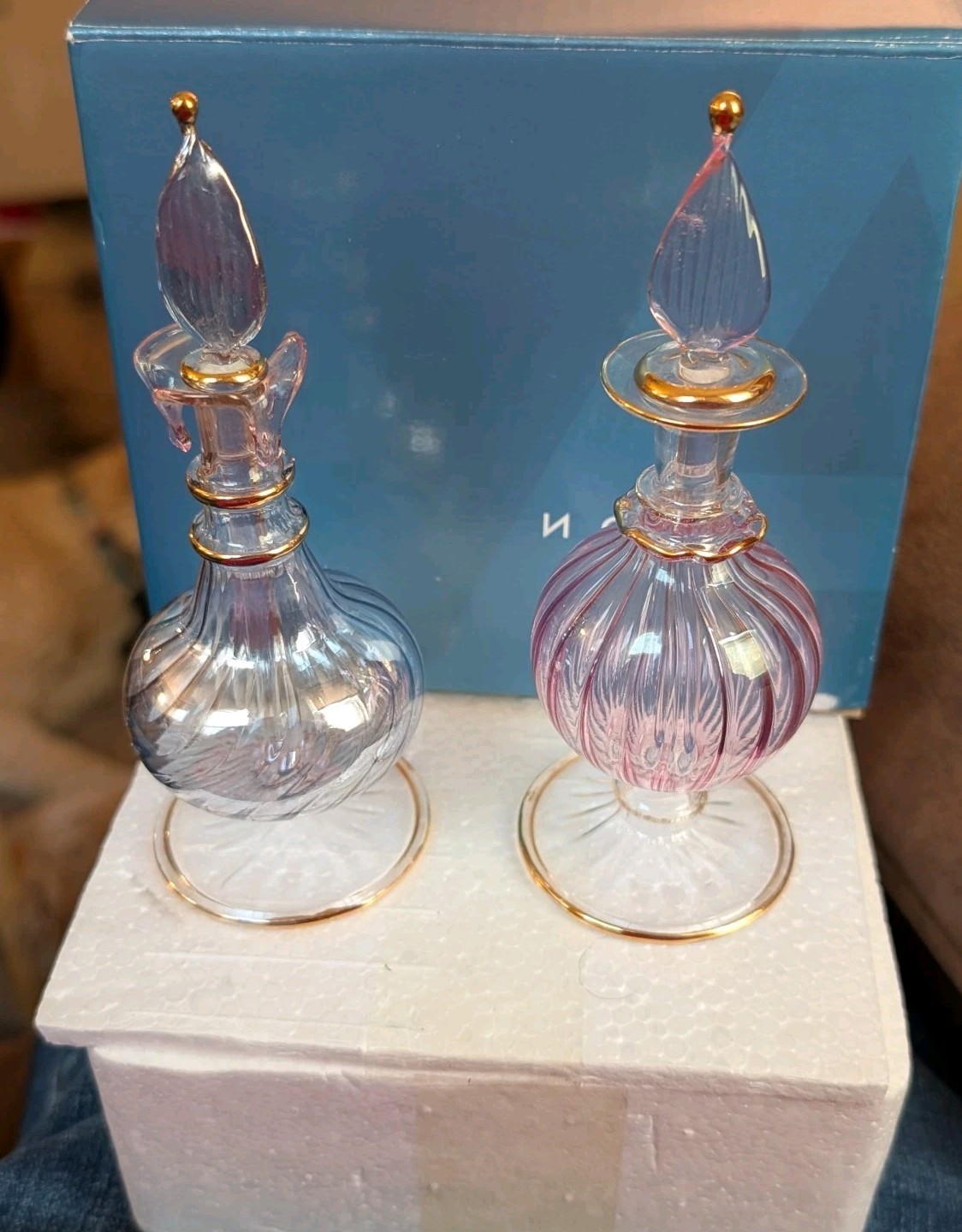 New Avon 2006 Iridescent Glass Perfume Bottles 1 Pink And 1 Blue With Gold Trim New Avon 2006 Iridescent Glass Perfume Bottles 1 Pink And 1 Blue With Gold Trim