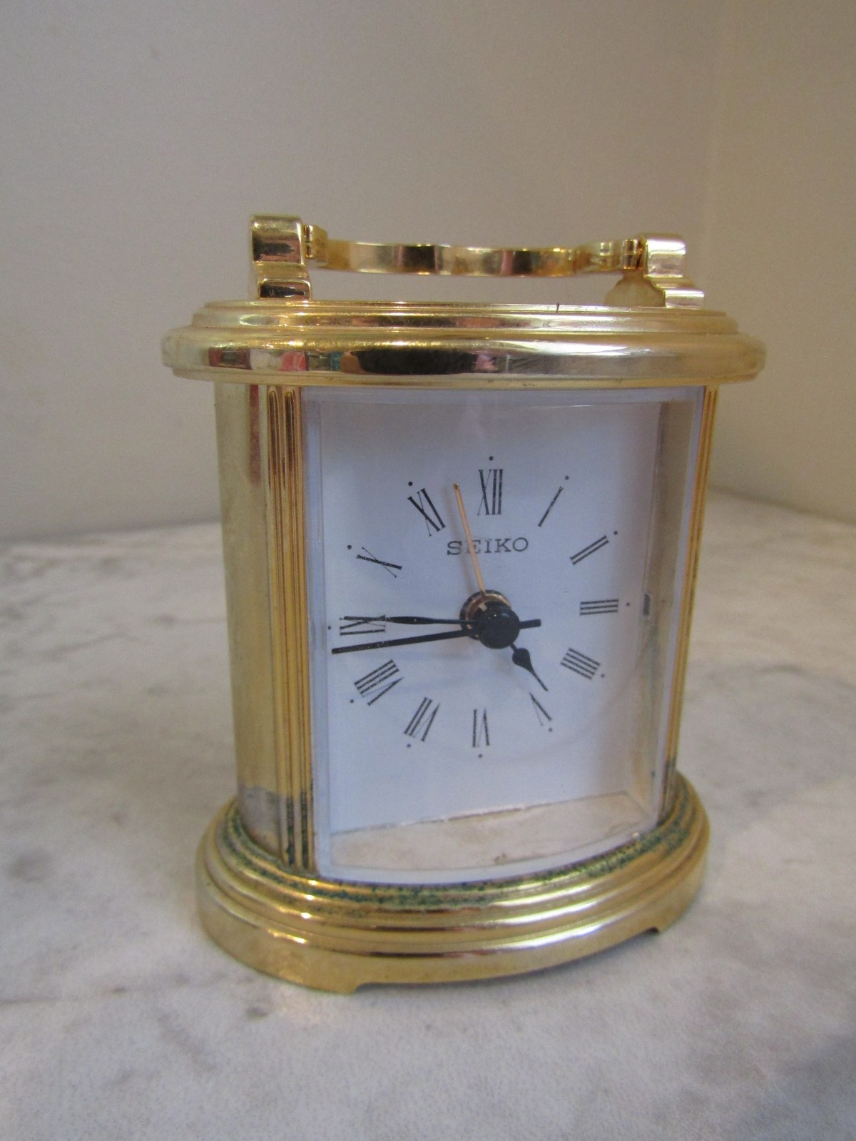 Vintage QHE109GLH Seiko Quartz Carriage Design Clock Metal Frame Roman Numerals Vintage QHE109GLH Seiko Quartz Carriage Design Clock Metal Frame Roman Numerals