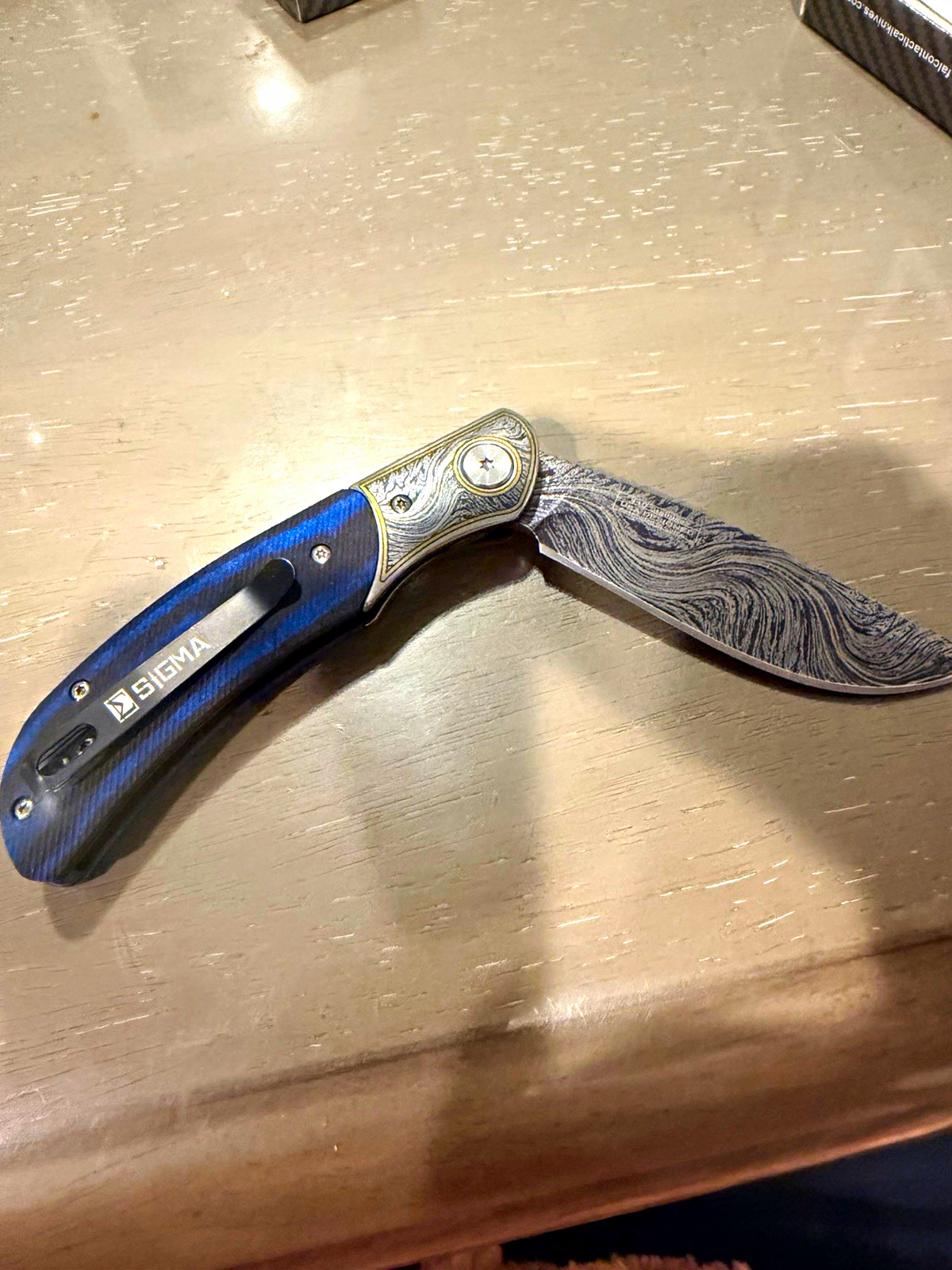 SIGMA Blue Carbon Fiber Handle Manual Drop Point Damascus Pocketknife Clip