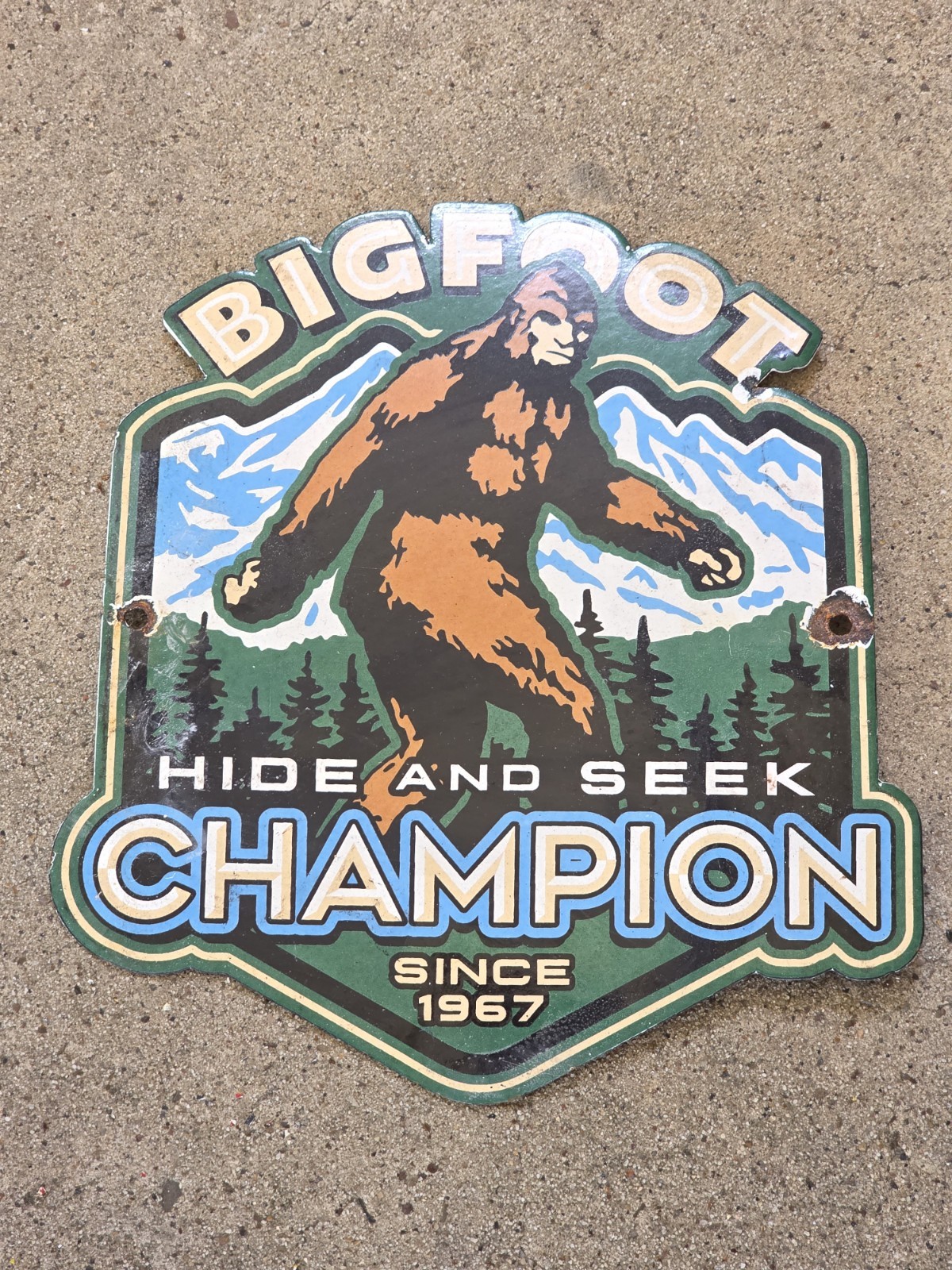 VINTAGE BIGFOOT CHAMPION SPARK PLUGS PORCELAIN SIGN \'HIDE AND SEEK\' 10\
