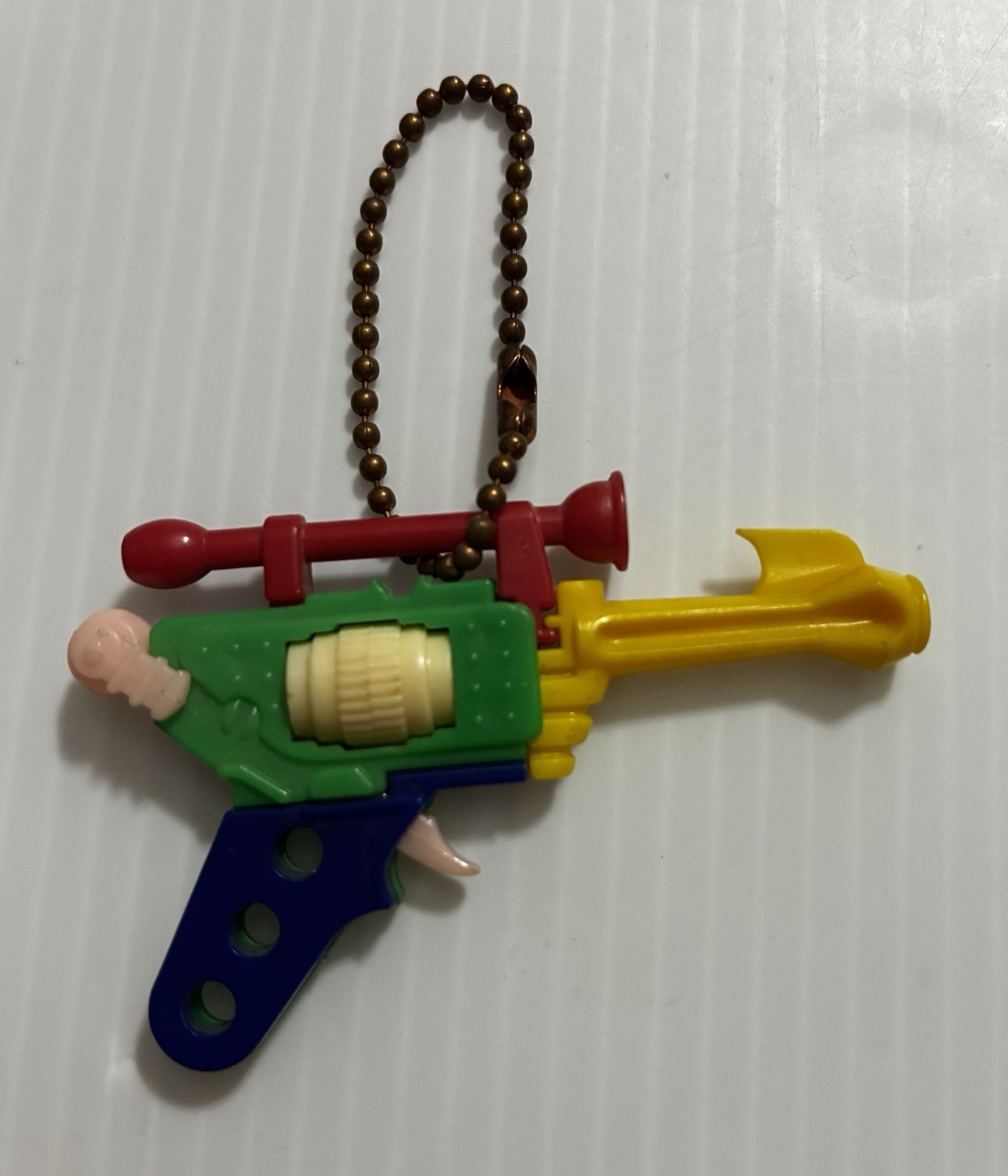 Vintage 1950’s Ray Gun/Space Gun Puzzle Keychain Charm