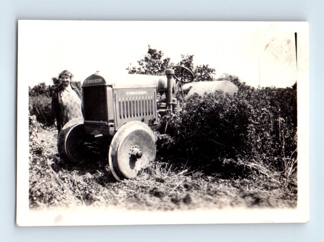 Old Vintage Photo SOLO WOMAN MCCORMICK DEERING FARM TRACTOR SNAPSHOT