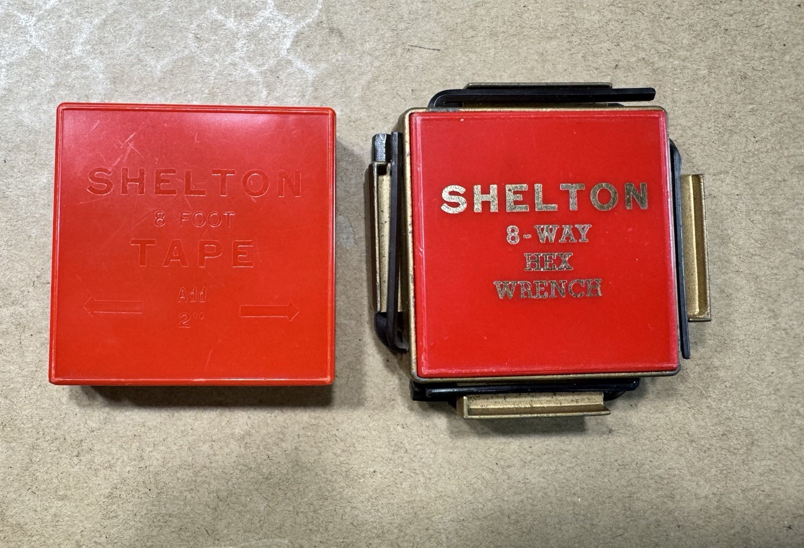 Vintage Shelton 8-foot tape measure and 8-way hex wrench, both made in the USA.