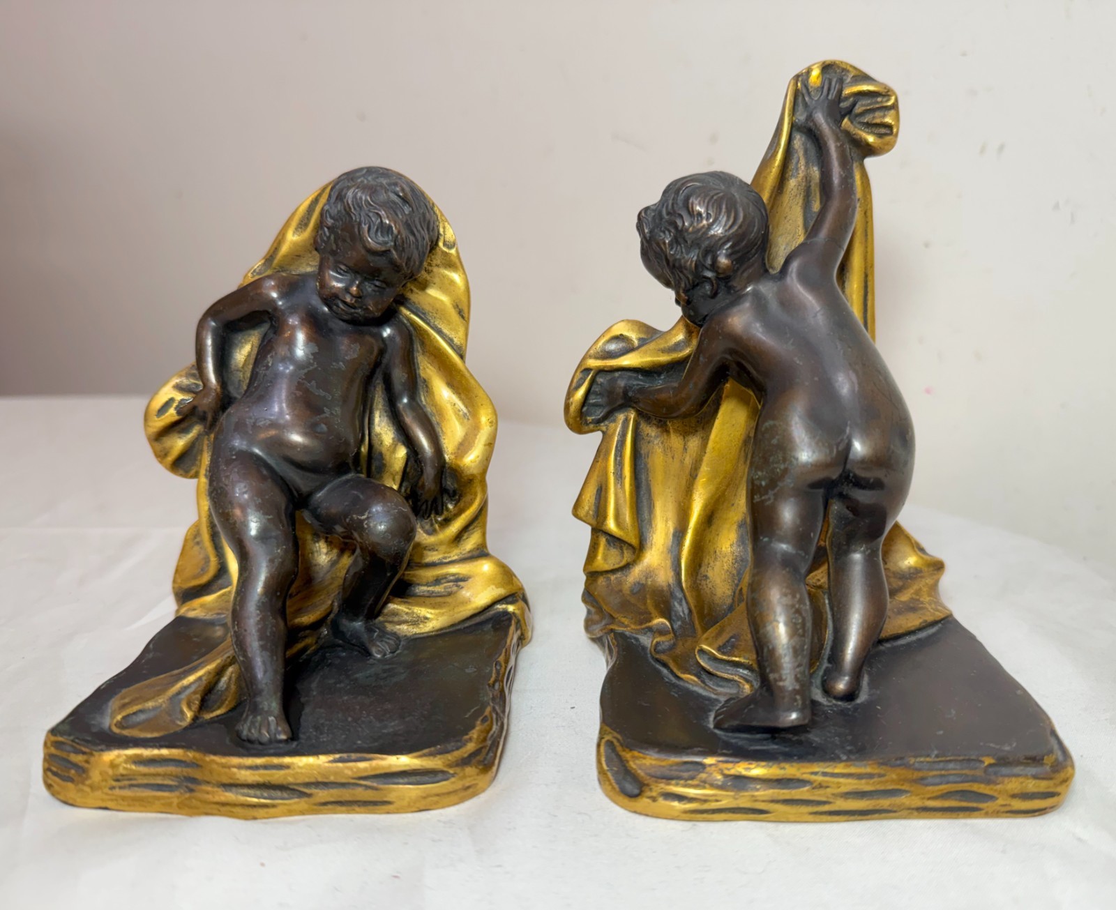 Pair of antique 1800's Sterling Bronze co cherub putti ormolu patinated bookends Pair of antique 1800's Sterling Bronze co cherub putti ormolu patinated bookends
