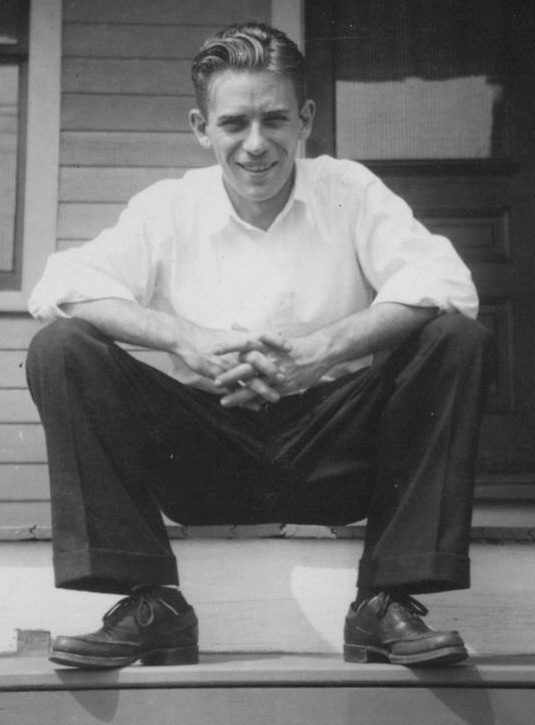 1940s Handsome Man Smiling Portrait Crouching Porch Steps Casual Style