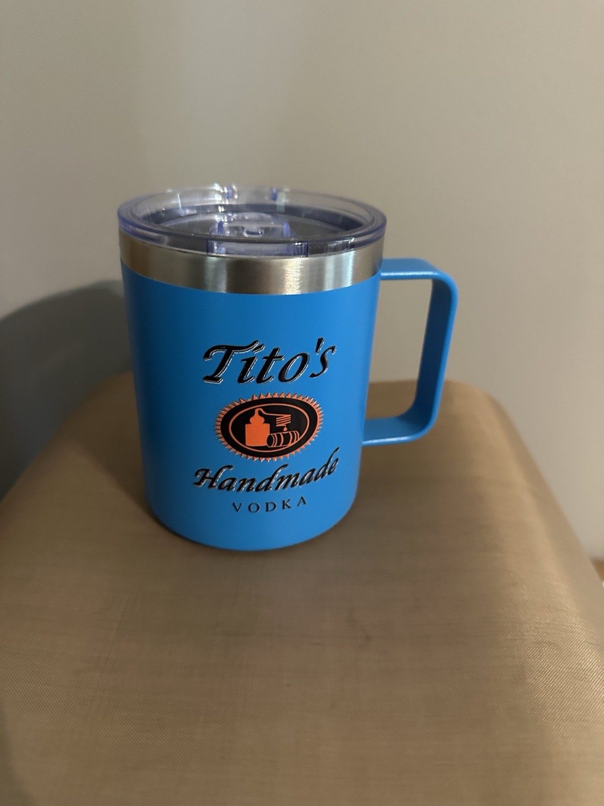 New 12oz  Blue Tumbler With Tito’s Vodka Logo on It.