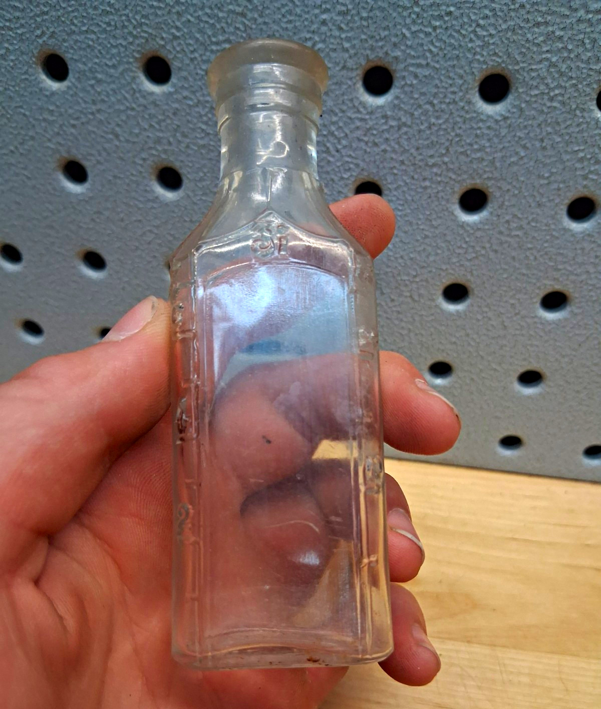 Small Clear Glass Medicine Bottle, Rectangular, Embossed Base Small Clear Glass Medicine Bottle, Rectangular, Embossed Base
