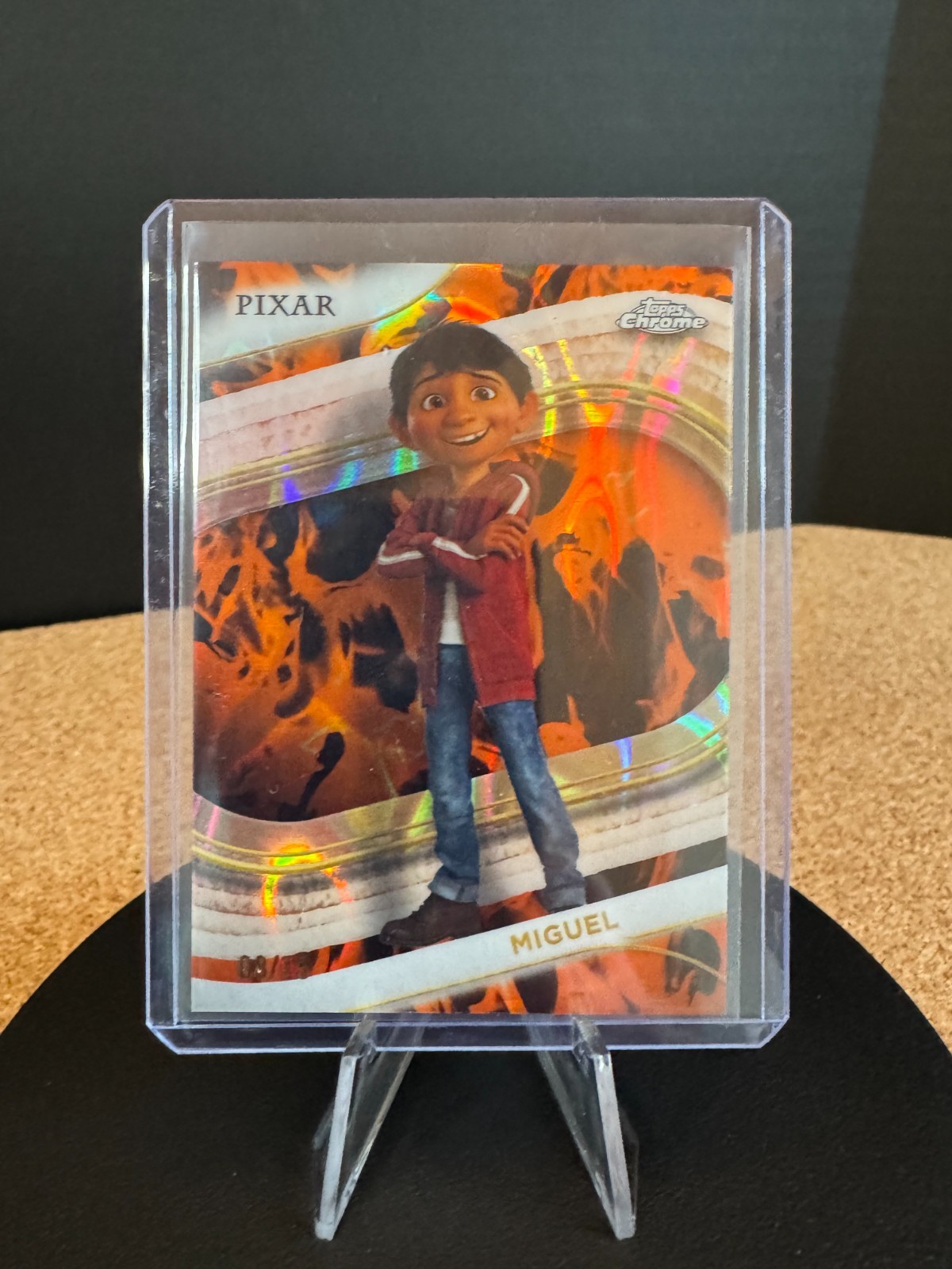 2025 Topps Chrome Disney Coco Miguel / 15 Toy Story Incinerator Lava Refractor