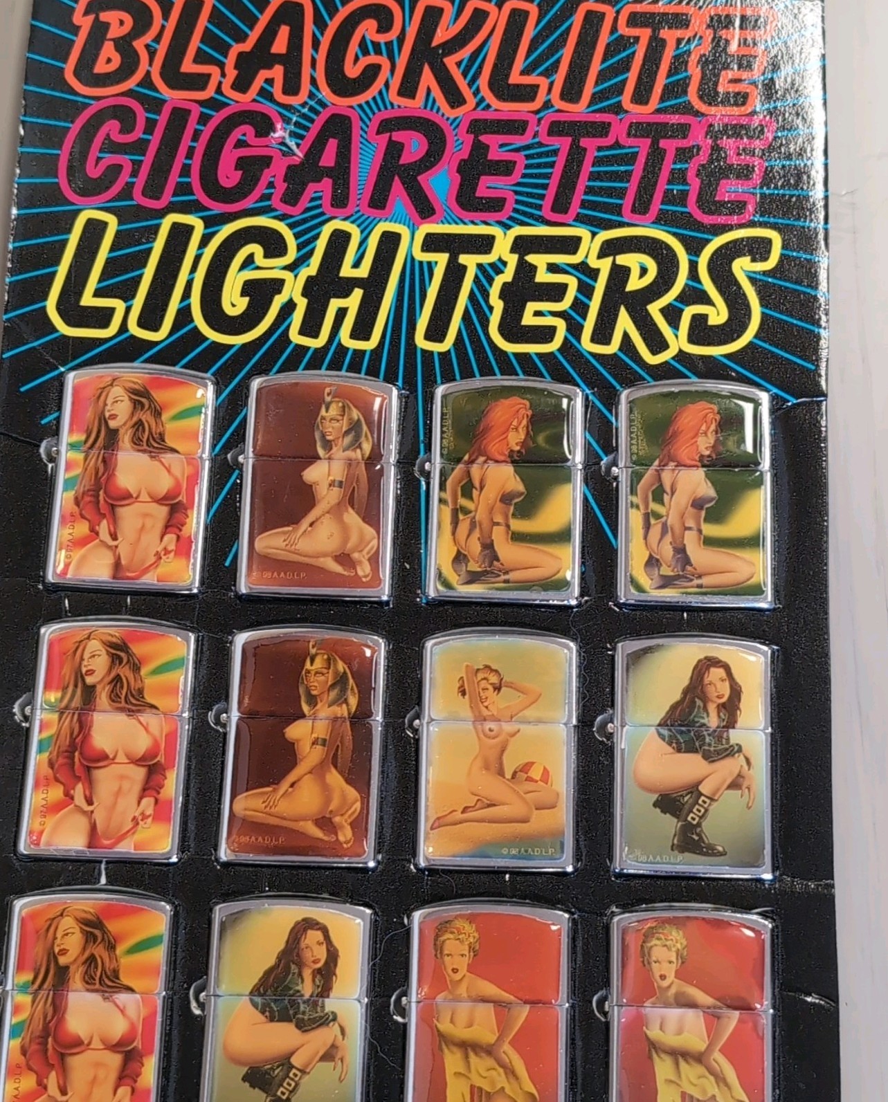 Vintage 1990's Display Pinup Girl 12 Nude Blacklight Cigarette Lighters Vintage 1990's Display Pinup Girl 12 Nude Blacklight Cigarette Lighters