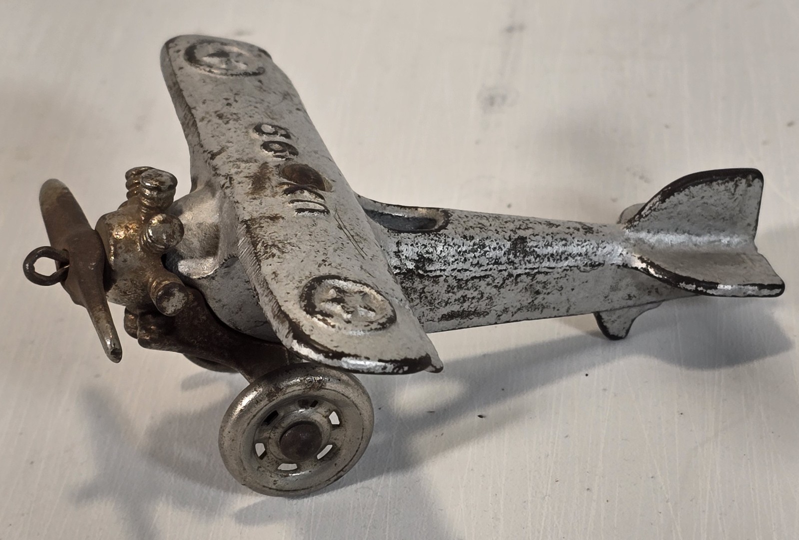 Antique Vintage A.C. Williams “UX 99” Cast Iron Airplane Toy