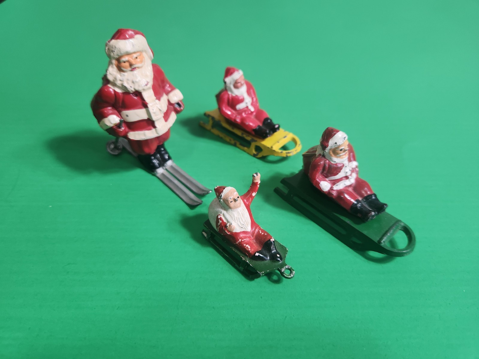 VINTAGE BARCLAY SANTA CLAUS SLEDS SKIS LOT OF 4