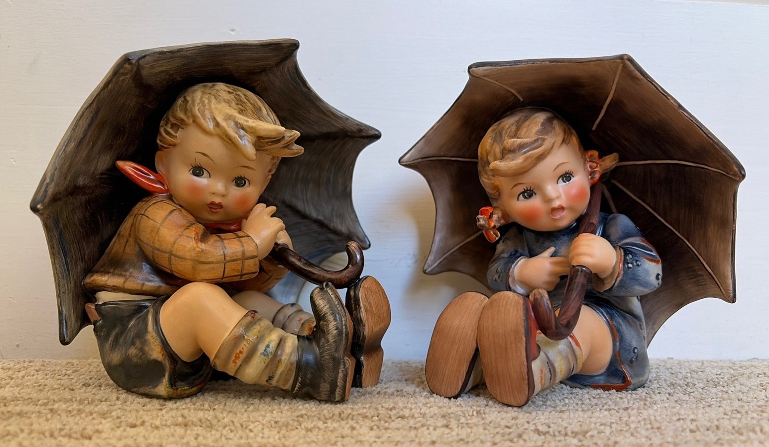 Hummel “Umbrella Boy and Umbrella Girl” 5 inch tall figurines. Hummel “Umbrella Boy and Umbrella Girl” 5 inch tall figurines.