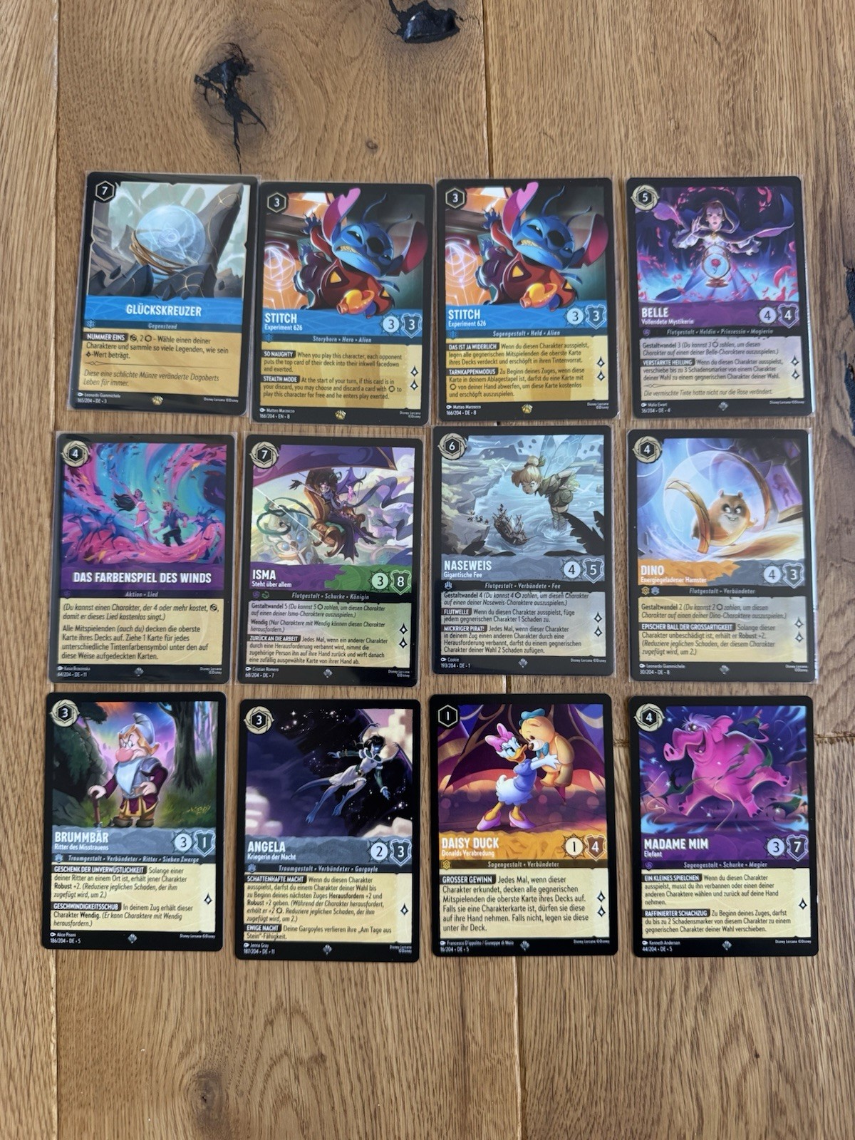 Lorcana / 3x Legendary, 9x Super Rare / Lot 12 Cards German