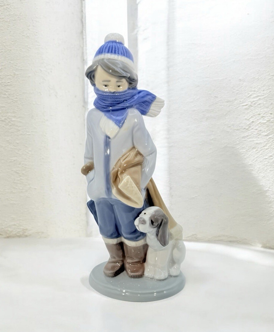 Lladro “WINTER BOY W/DOG\