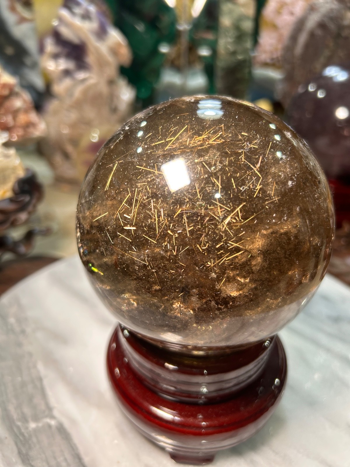Golden rutile Smoky quartz  sphere  on wood stand 4” Big