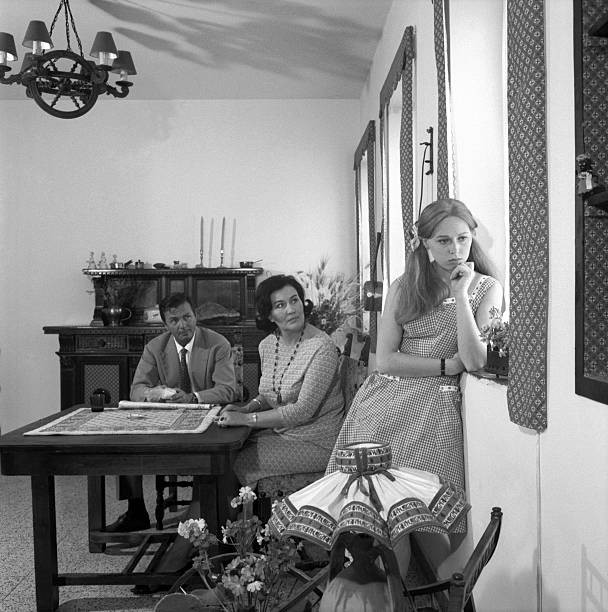 Two parents disapproving their daughters love story She feels misu- Old Photo