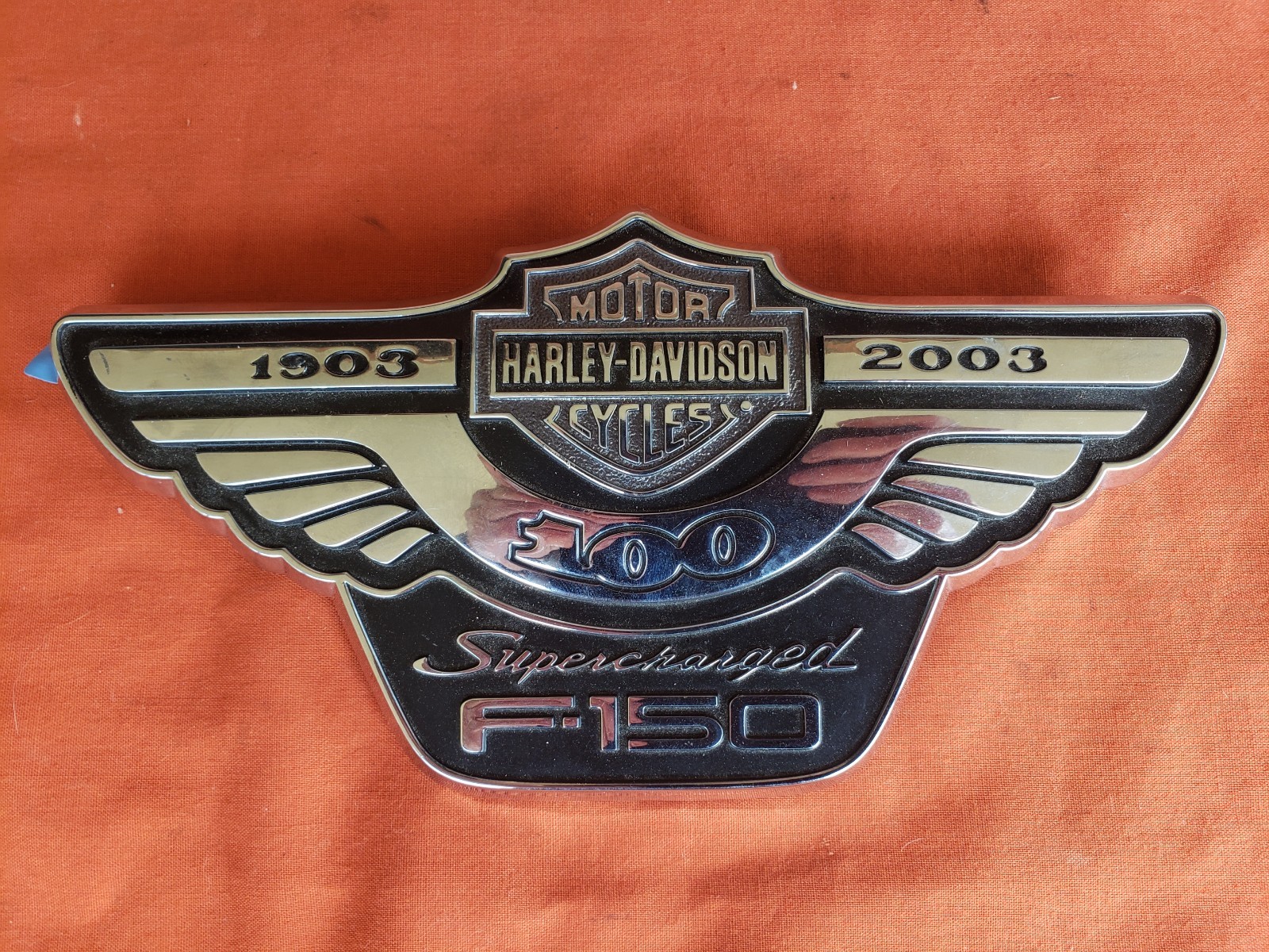 Harley-Davidson 100th Anniversary 1903-2003 Supercharged F-150 Fender Emblem. Harley-Davidson 100th Anniversary 1903-2003 Supercharged F-150 Fender Emblem.