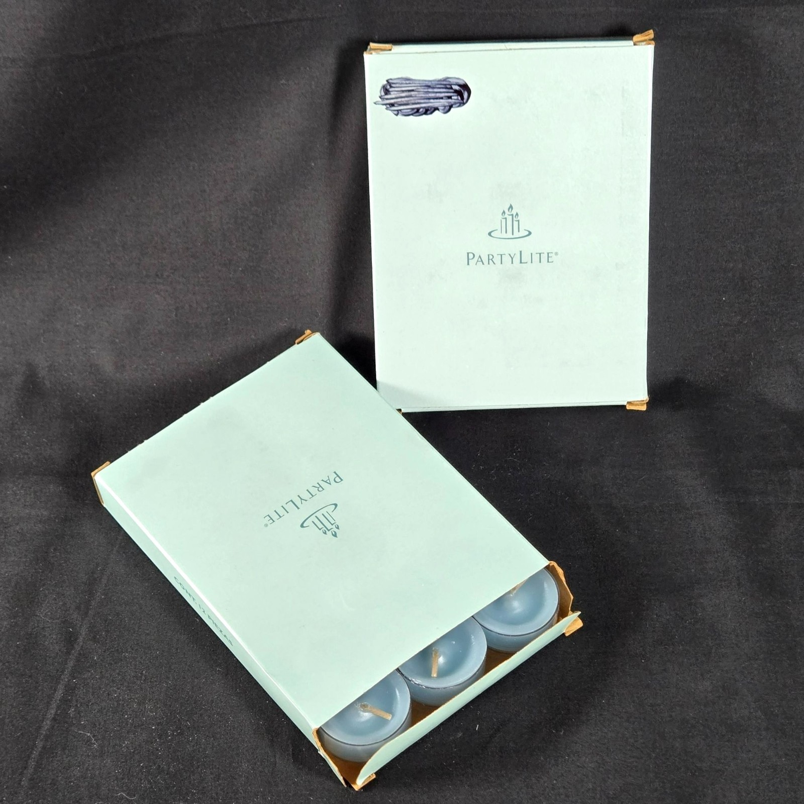 2 Boxes (24) Partylite Universal Tealight Candles Seaside Mist Scented 2 Boxes (24) Partylite Universal Tealight Candles Seaside Mist Scented