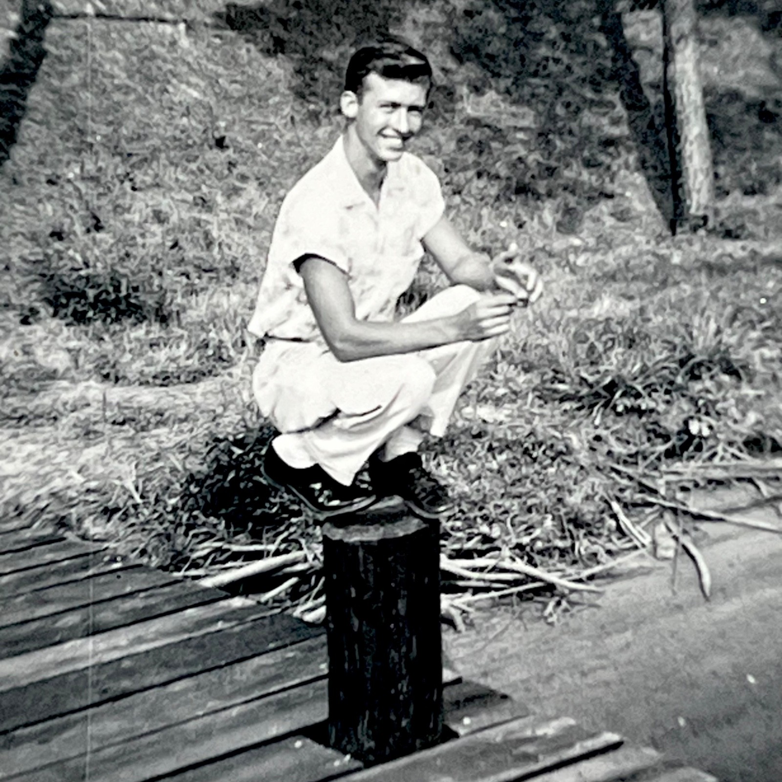 1940s Handsome Young Man Crouching On Post Quirky Vintage Snapshot Photo