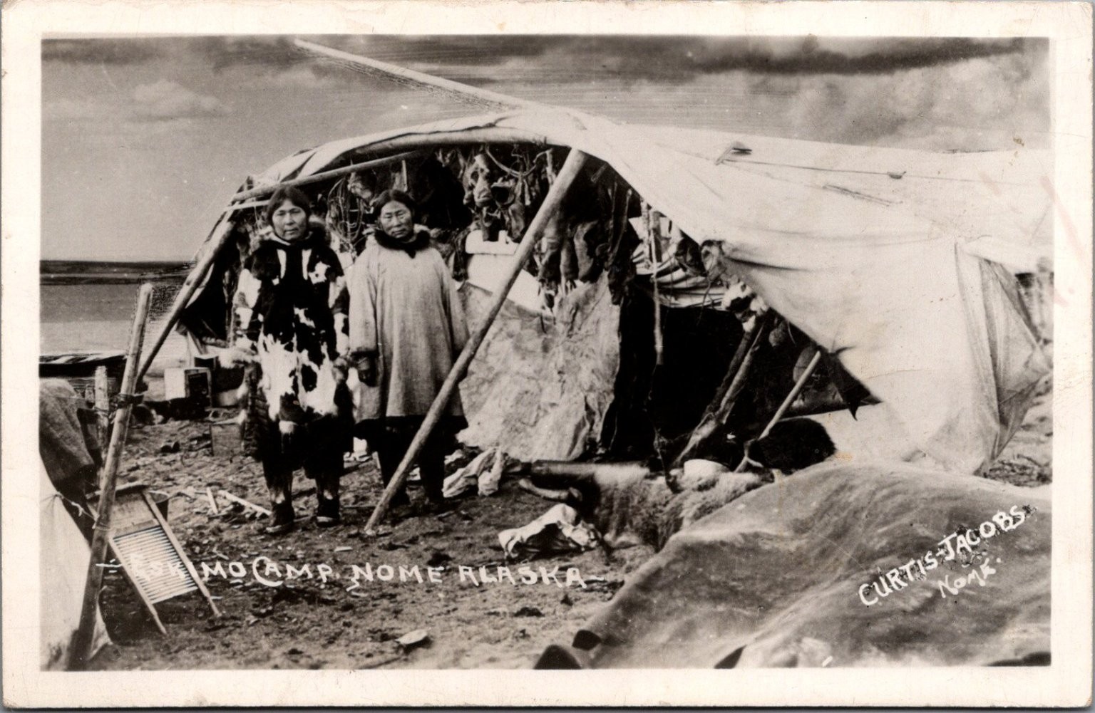 RPPC Eskimo Camp Nome Alaska Curtis-Jacobs Indigenous People Fur Drying 1910s RPPC Eskimo Camp Nome Alaska Curtis-Jacobs Indigenous People Fur Drying 1910s