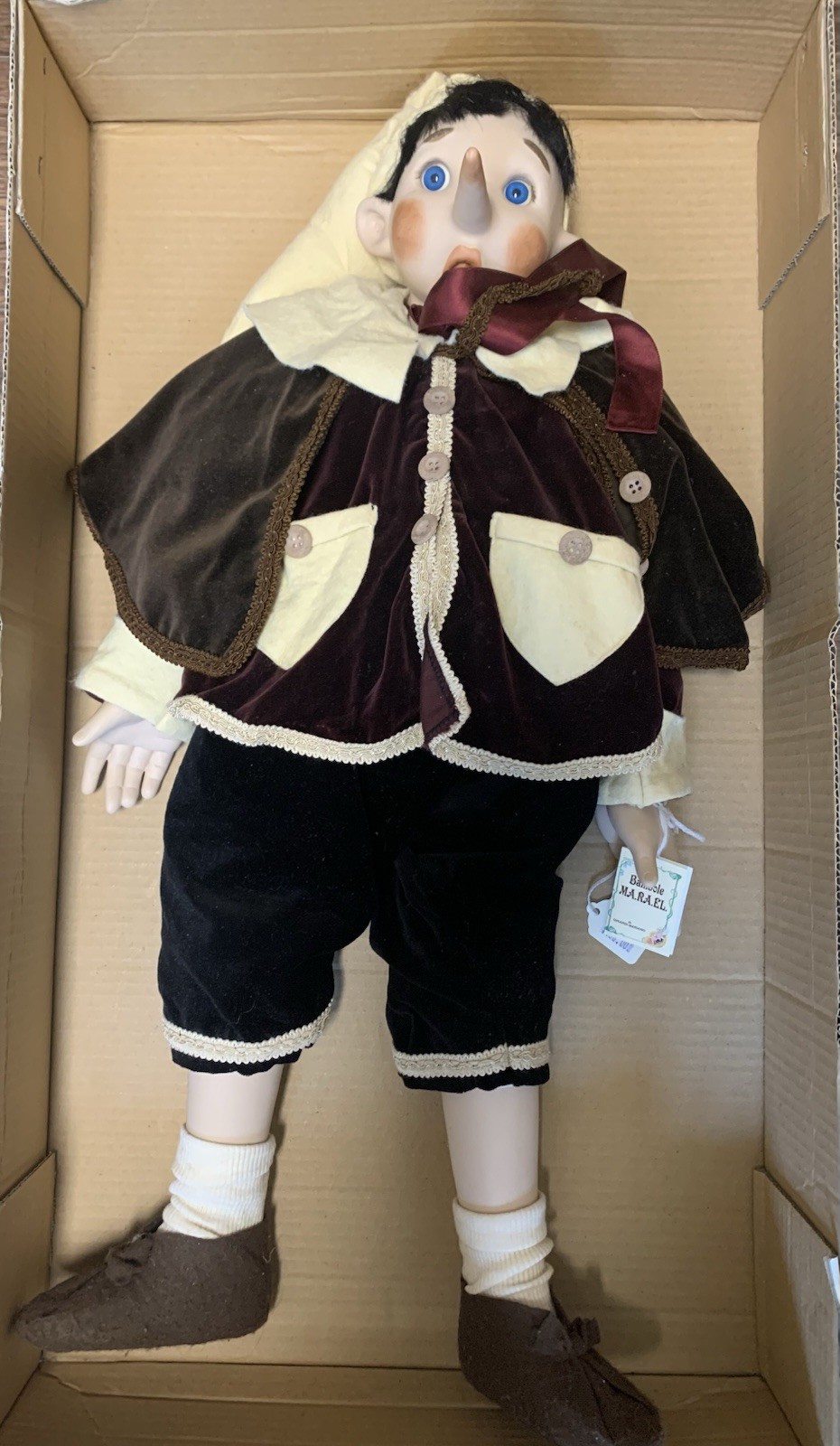 New Vintage Authentic Rare MARAEL Porcelain Pinocchio doll. XL .H: 25”Glass Eyes New Vintage Authentic Rare MARAEL Porcelain Pinocchio doll. XL .H: 25”Glass Eyes