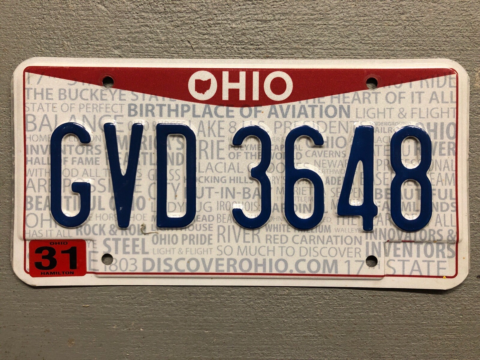OHIO LICENSE PLATE DISCOVER OHIO.COM RED/WHITE/BLUE RANDOM LETTERS/NUMBERS FAIR