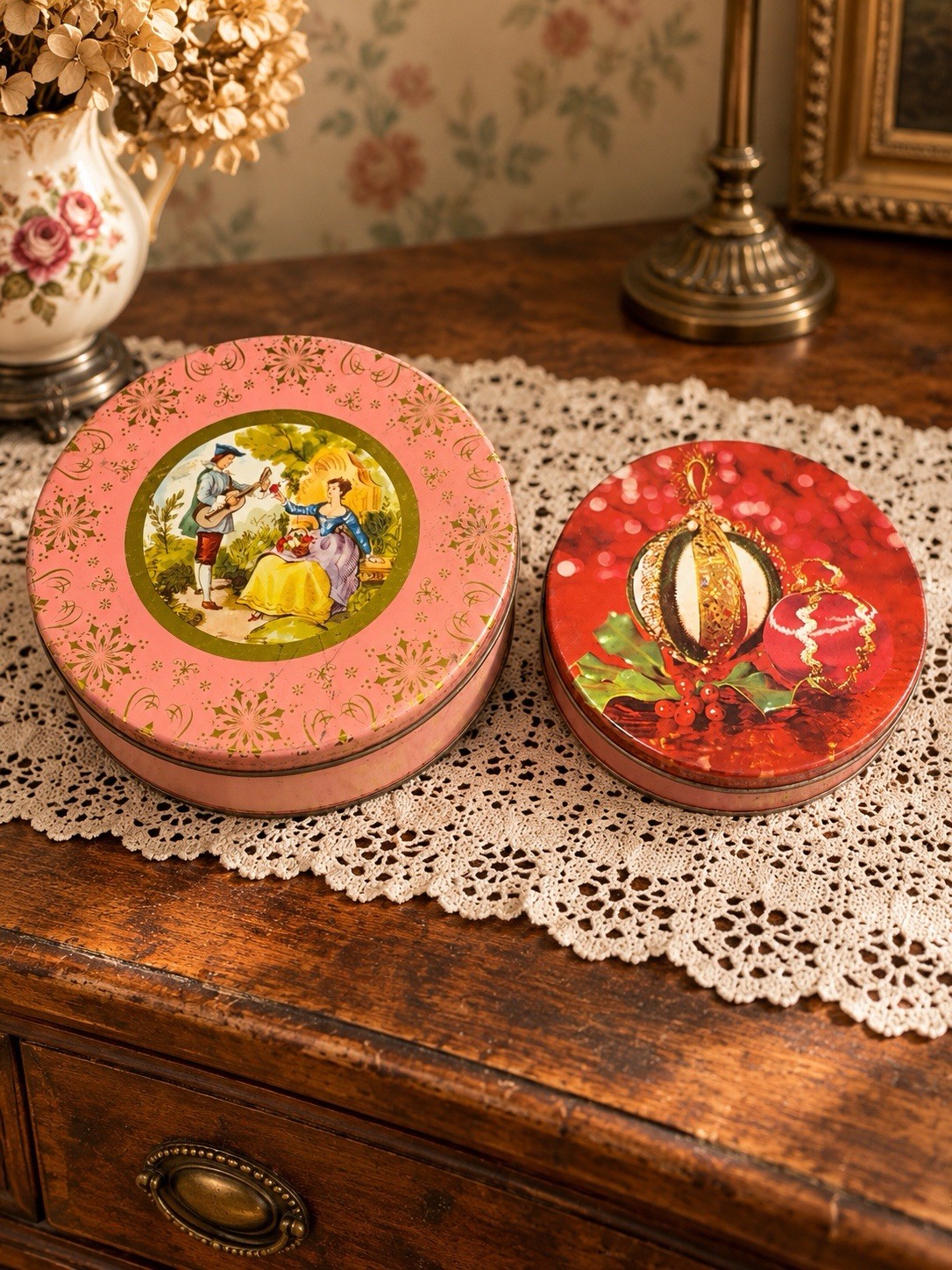 Vintage Round Metal Tin Lot of 2 Pink Courting Couple & Red Christmas Ornaments